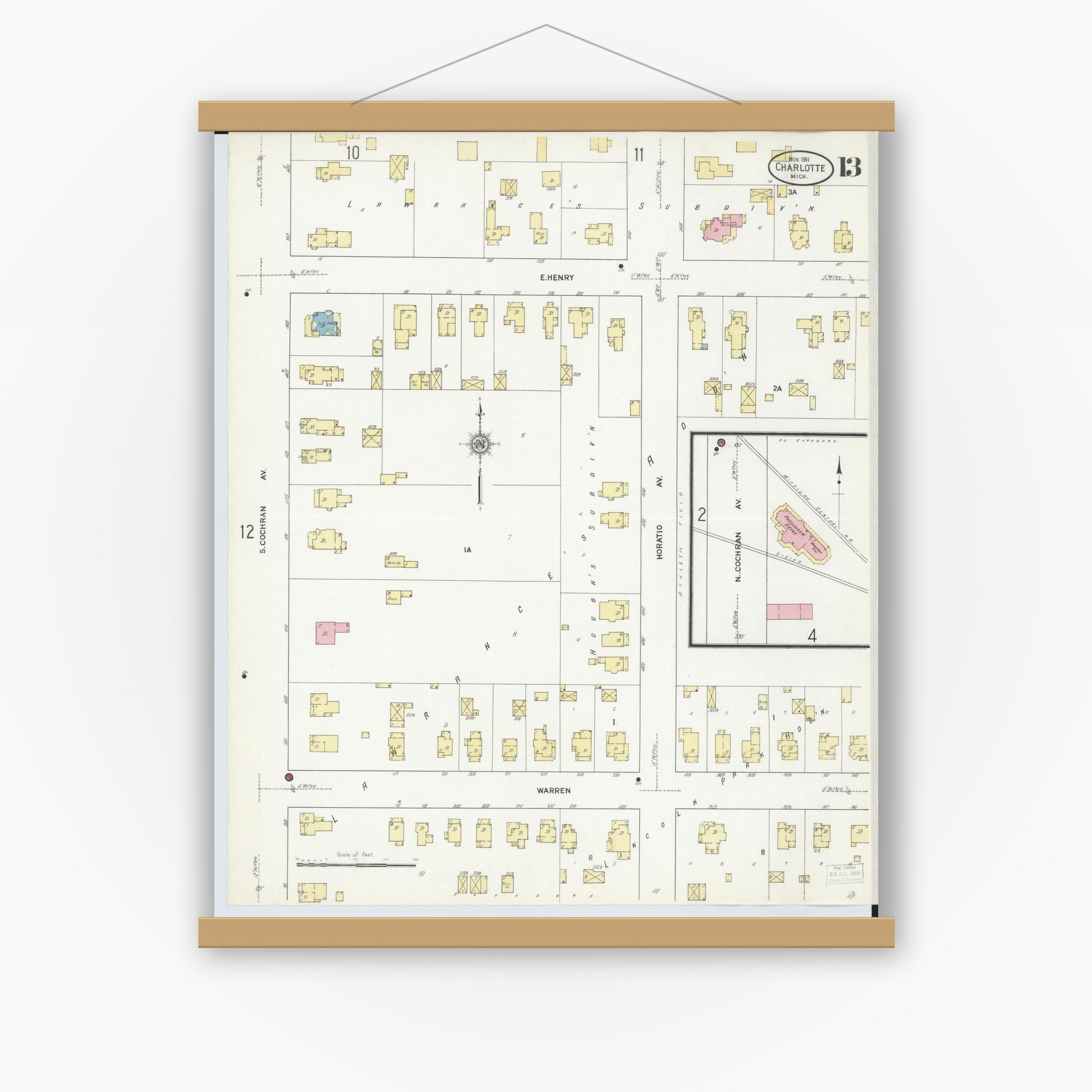 Old map wall art mockup — magnetic wood frame on white wall — Sanborn Fire Insurance Map from Charlotte, Eaton County, Michigan (1911), Sheet #0013