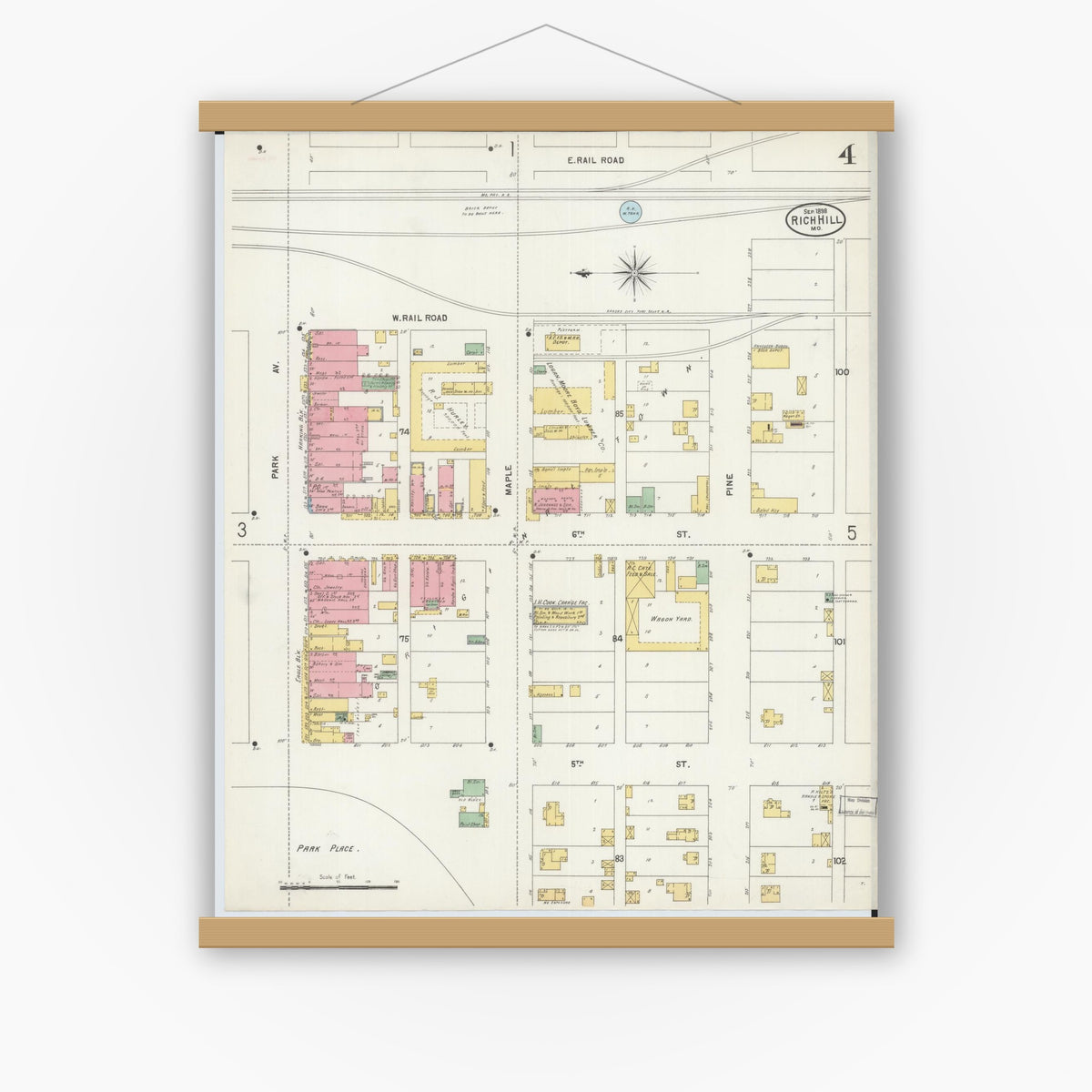 Old map wall art mockup — magnetic wood frame on white wall — Sanborn Fire Insurance Map from Rich Hill, Bates County, Missouri (1898), Sheet #0004