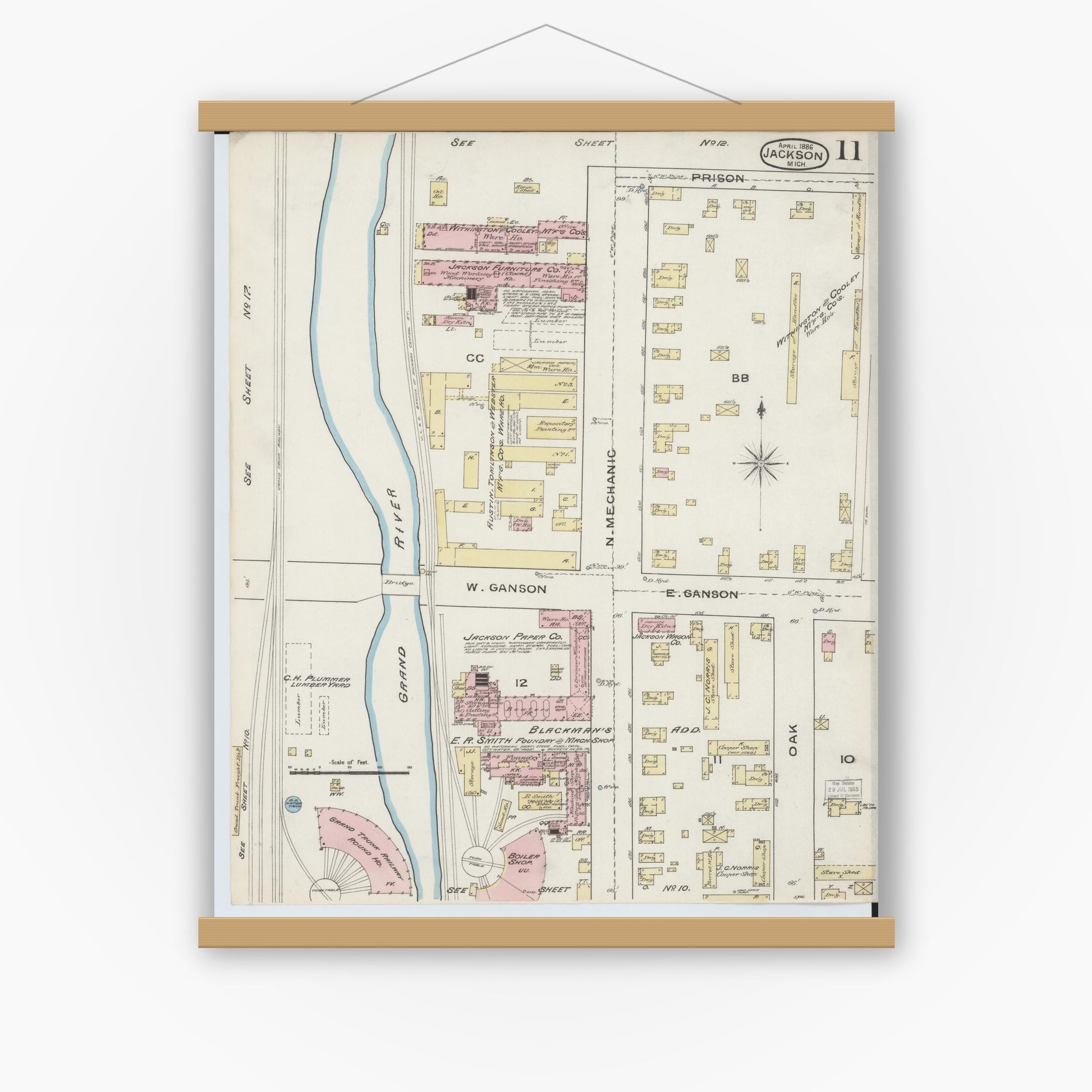 Old map wall art mockup — magnetic wood frame on white wall — Sanborn Fire Insurance Map from Jackson, Jackson County, Michigan (1886), Sheet #0011