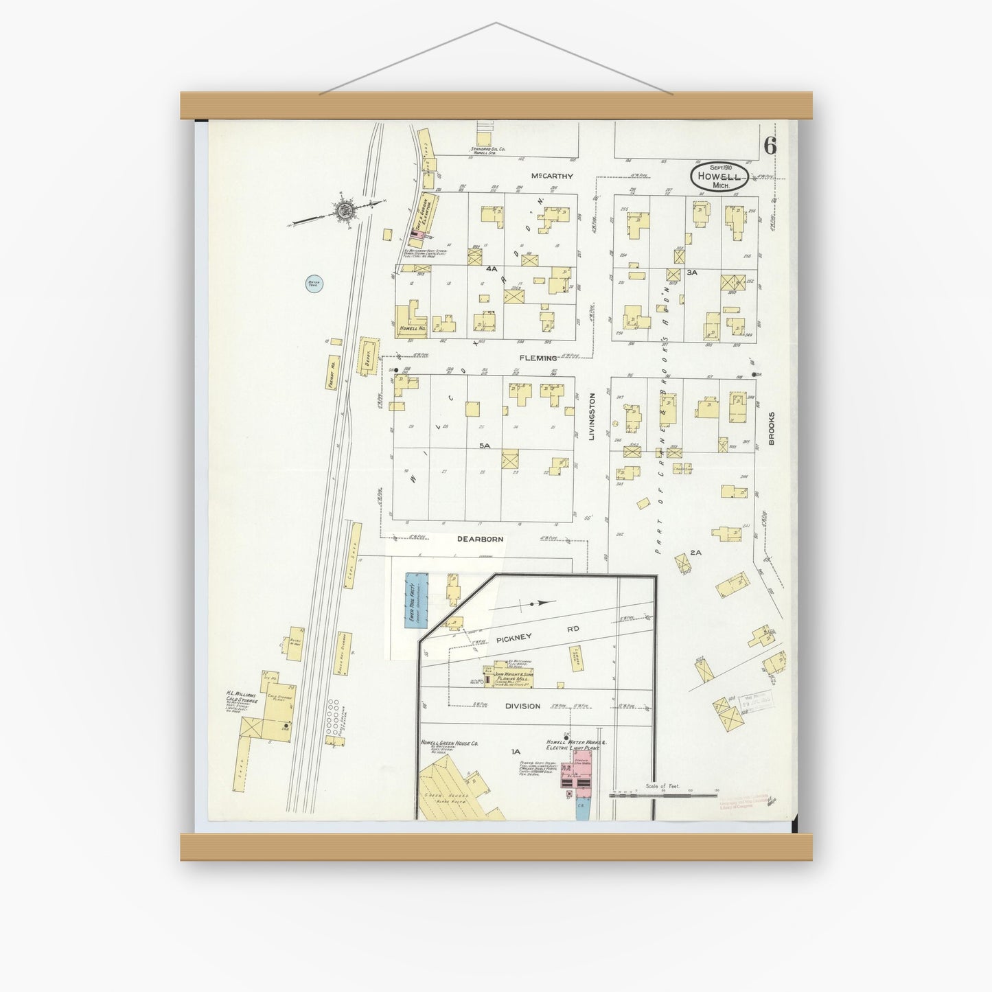 Old map wall art mockup — magnetic wood frame on white wall — Sanborn Fire Insurance Map from Howell, Livingston County, Michigan (1910), Sheet #0006
