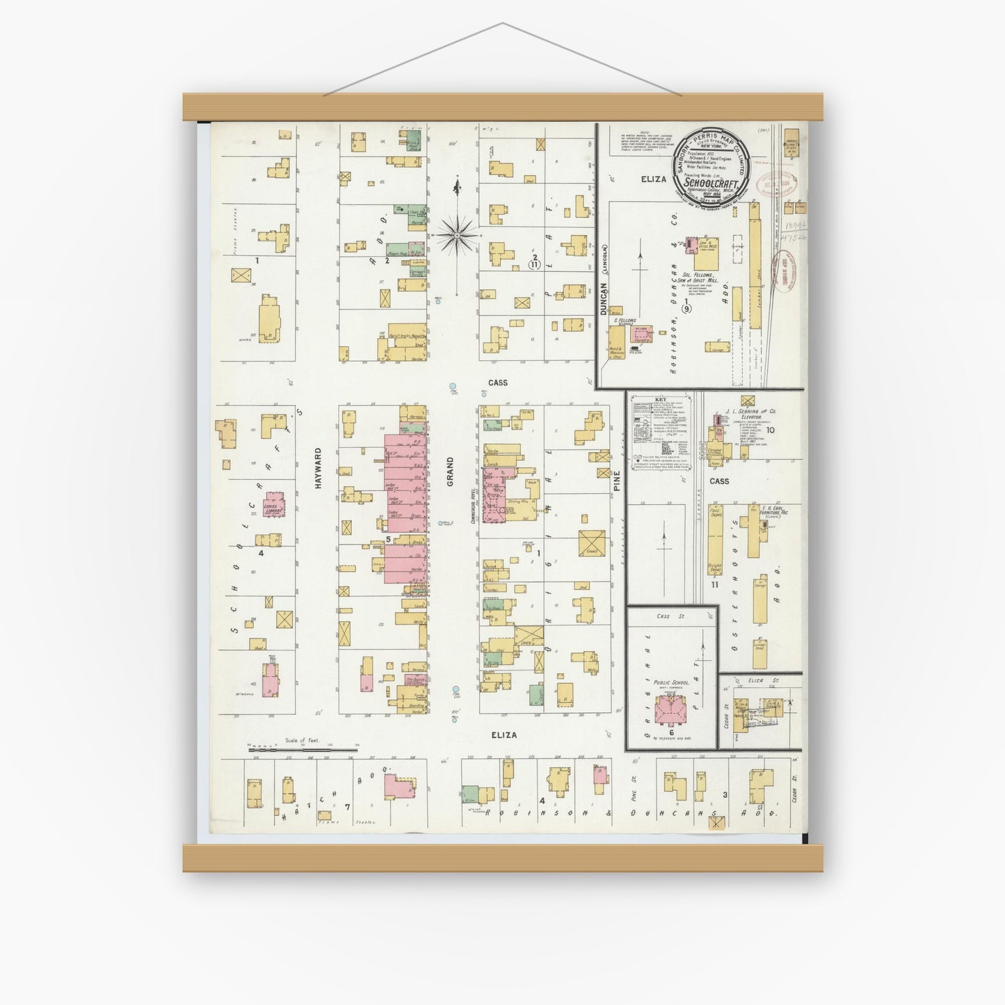 Old map wall art mockup — magnetic wood frame on white wall — Sanborn Fire Insurance Map from Schoolcraft, Kalamazoo County, Michigan (1899), Sheet #0001