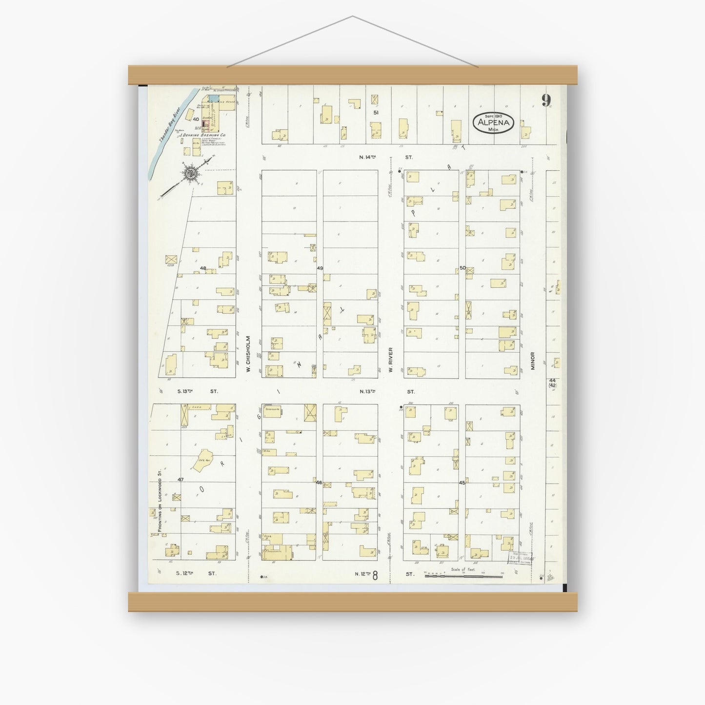 Old map wall art mockup — magnetic wood frame on white wall — Sanborn Fire Insurance Map from Alpena, Alpena County, Michigan (1910), Sheet #0009