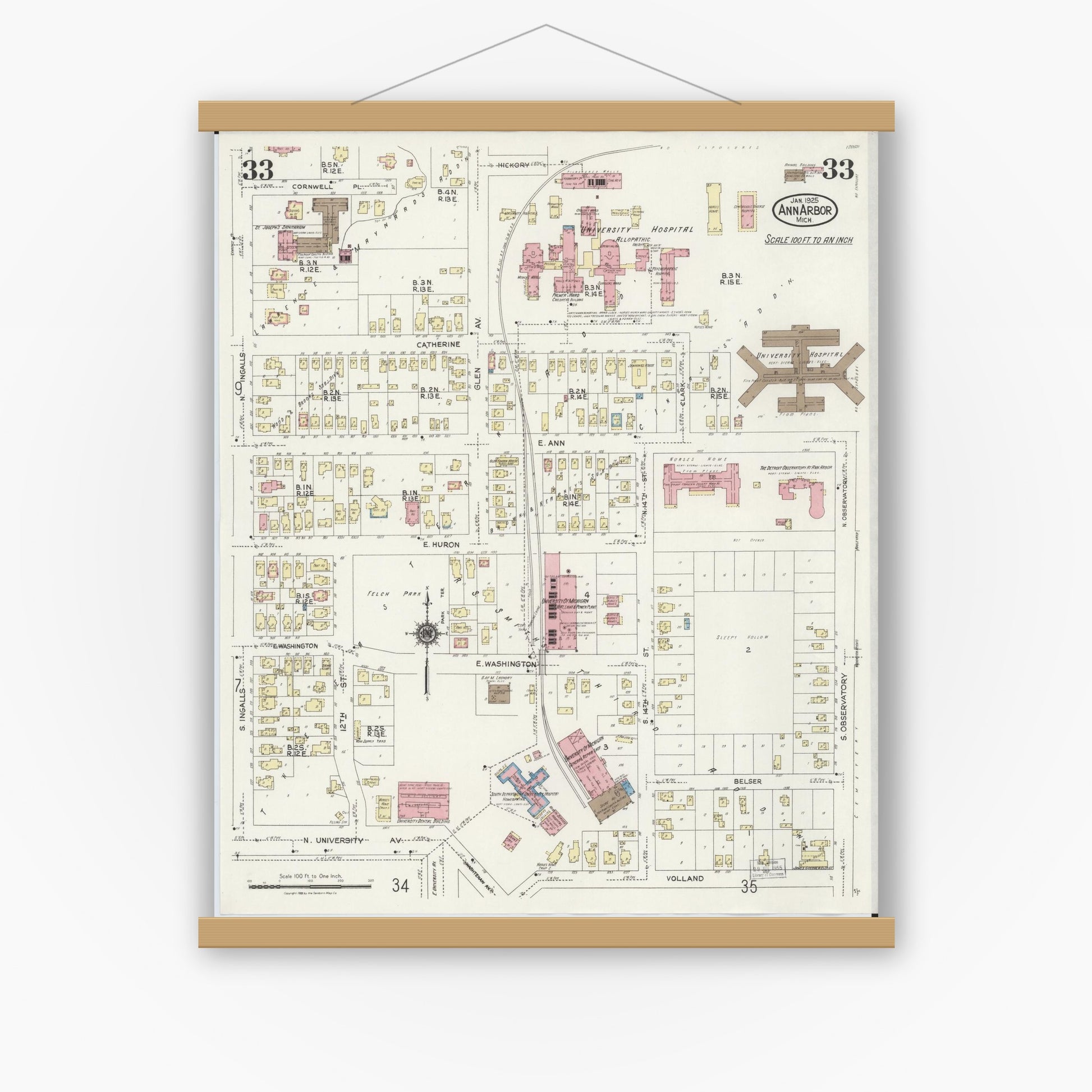 Old map wall art mockup — magnetic wood frame on white wall — Sanborn Fire Insurance Map from Ann Arbor, Washtenaw County, Michigan (1925), Sheet #0033