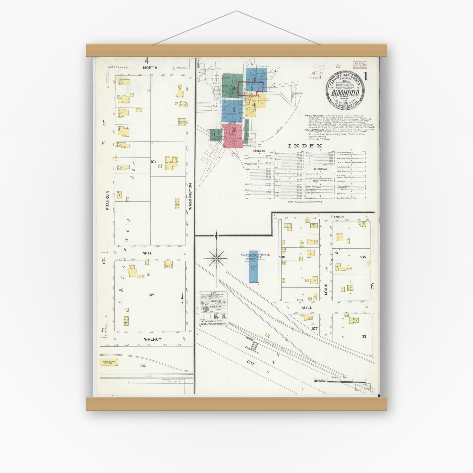 Old map wall art mockup — magnetic wood frame on white wall — Sanborn Fire Insurance Map from Bloomfield, Greene County, Indiana (1907), Sheet #0001