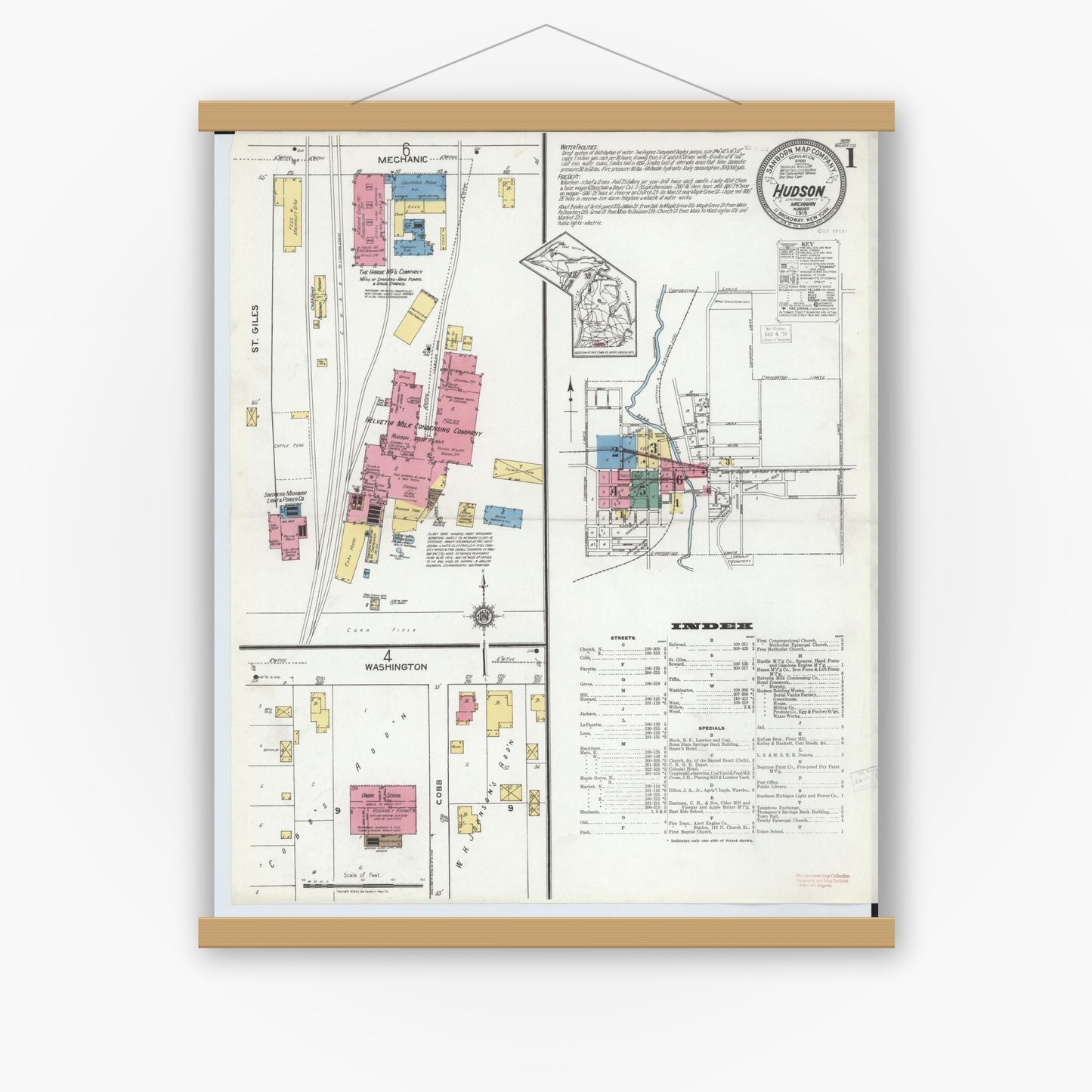Old map wall art mockup — magnetic wood frame on white wall — Sanborn Fire Insurance Map from Hudson, Lenawee County, Michigan (1919) - Complete Map Set