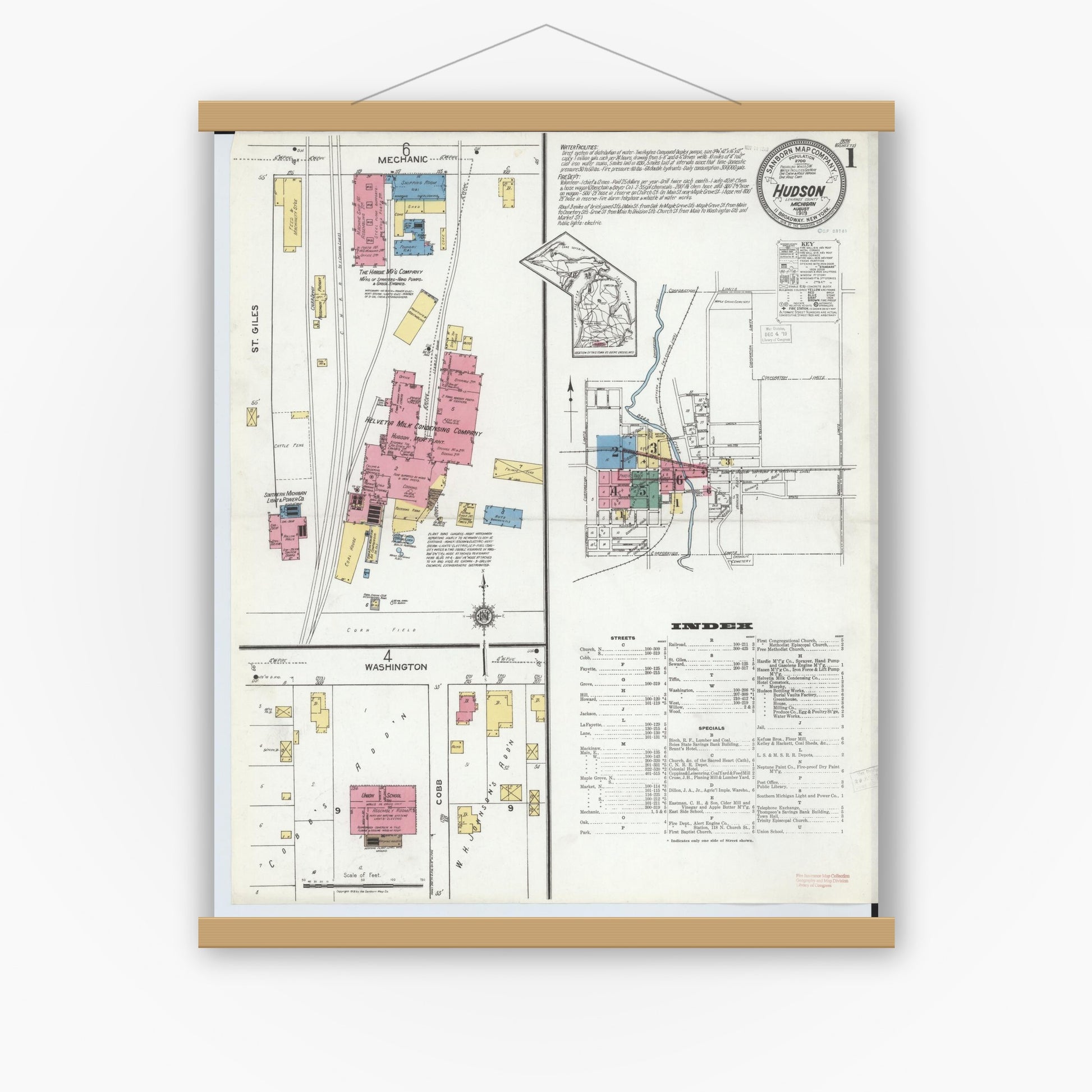 Old map wall art mockup — magnetic wood frame on white wall — Sanborn Fire Insurance Map from Hudson, Lenawee County, Michigan (1919) - Complete Map Set