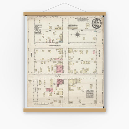 Old map wall art mockup — magnetic wood frame on white wall — Sanborn Fire Insurance Map from Alma, Gratiot County, Michigan (1884) - Complete Map Set