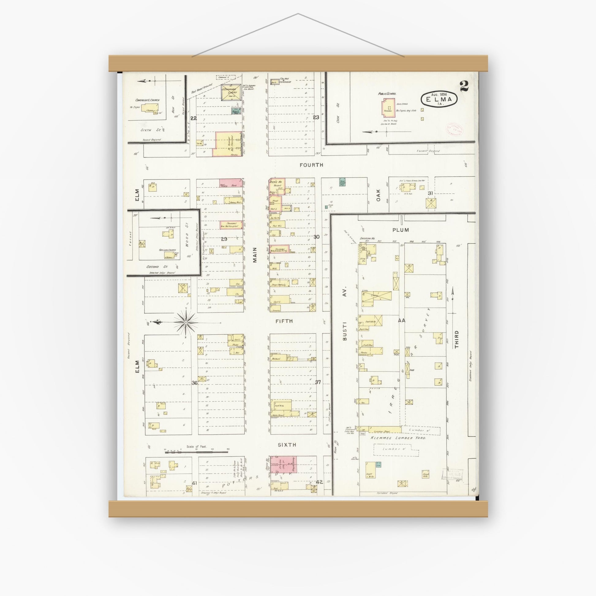 Old map wall art mockup — magnetic wood frame on white wall — Sanborn Fire Insurance Map from Elma, Howard County, Iowa (1894), Sheet #0002