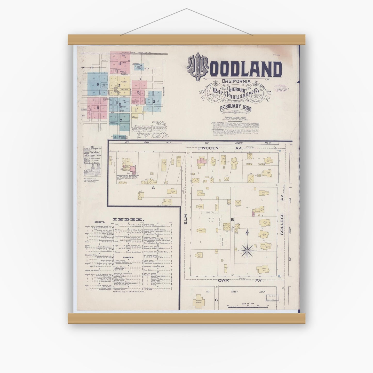 Old map wall art mockup — magnetic wood frame on white wall — Sanborn Fire Insurance Map from Woodland, Yolo County, California (1886) - Complete Map Set