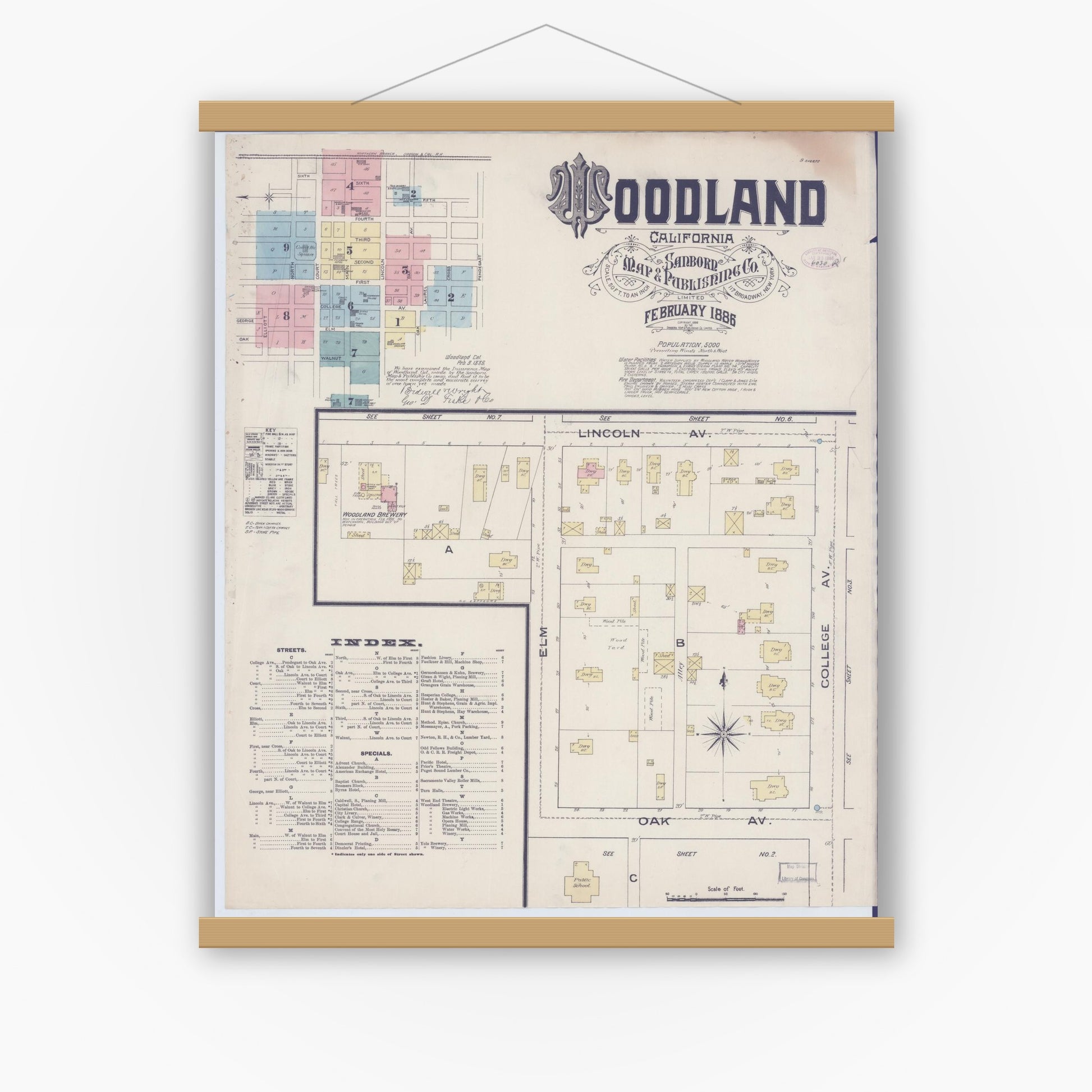 Old map wall art mockup — magnetic wood frame on white wall — Sanborn Fire Insurance Map from Woodland, Yolo County, California (1886) - Complete Map Set