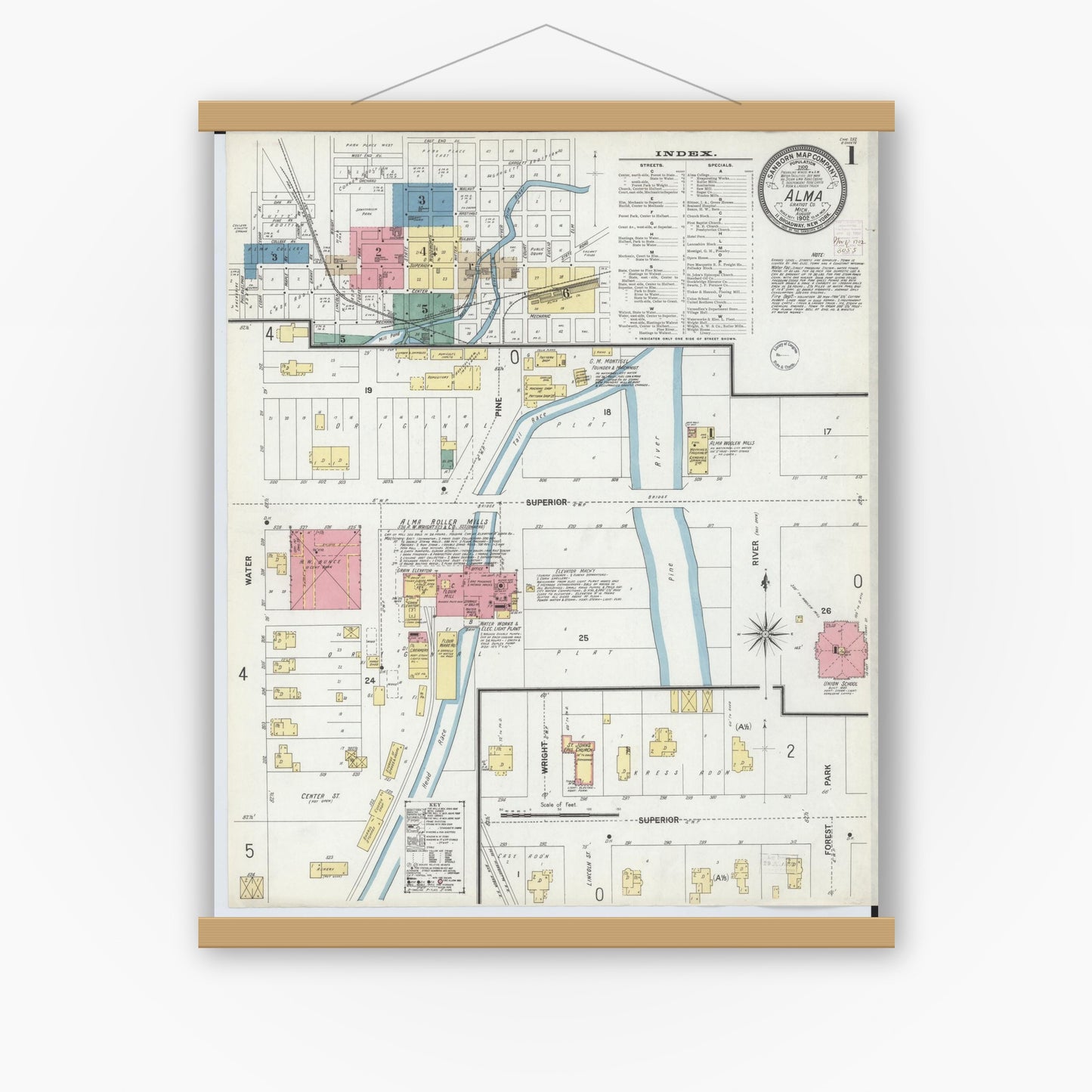 Old map wall art mockup — magnetic wood frame on white wall — Sanborn Fire Insurance Map from Alma, Gratiot County, Michigan (1902) - Complete Map Set