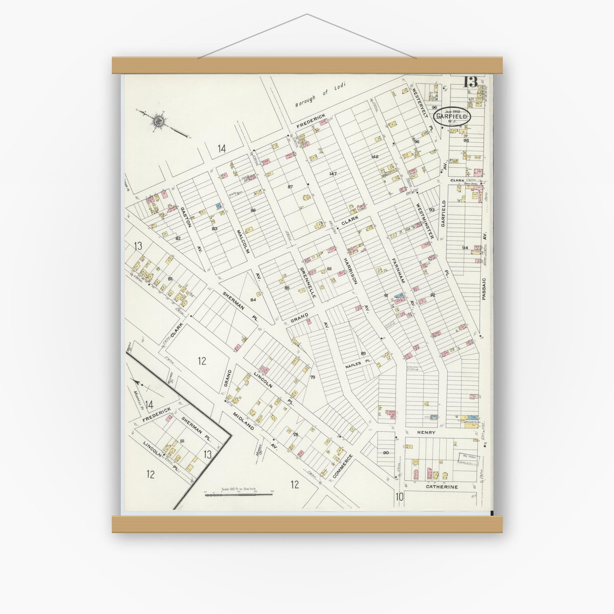 Old map wall art mockup — magnetic wood frame on white wall — Sanborn Fire Insurance Map from Garfield, Bergen County, New Jersey (1910), Sheet #0013