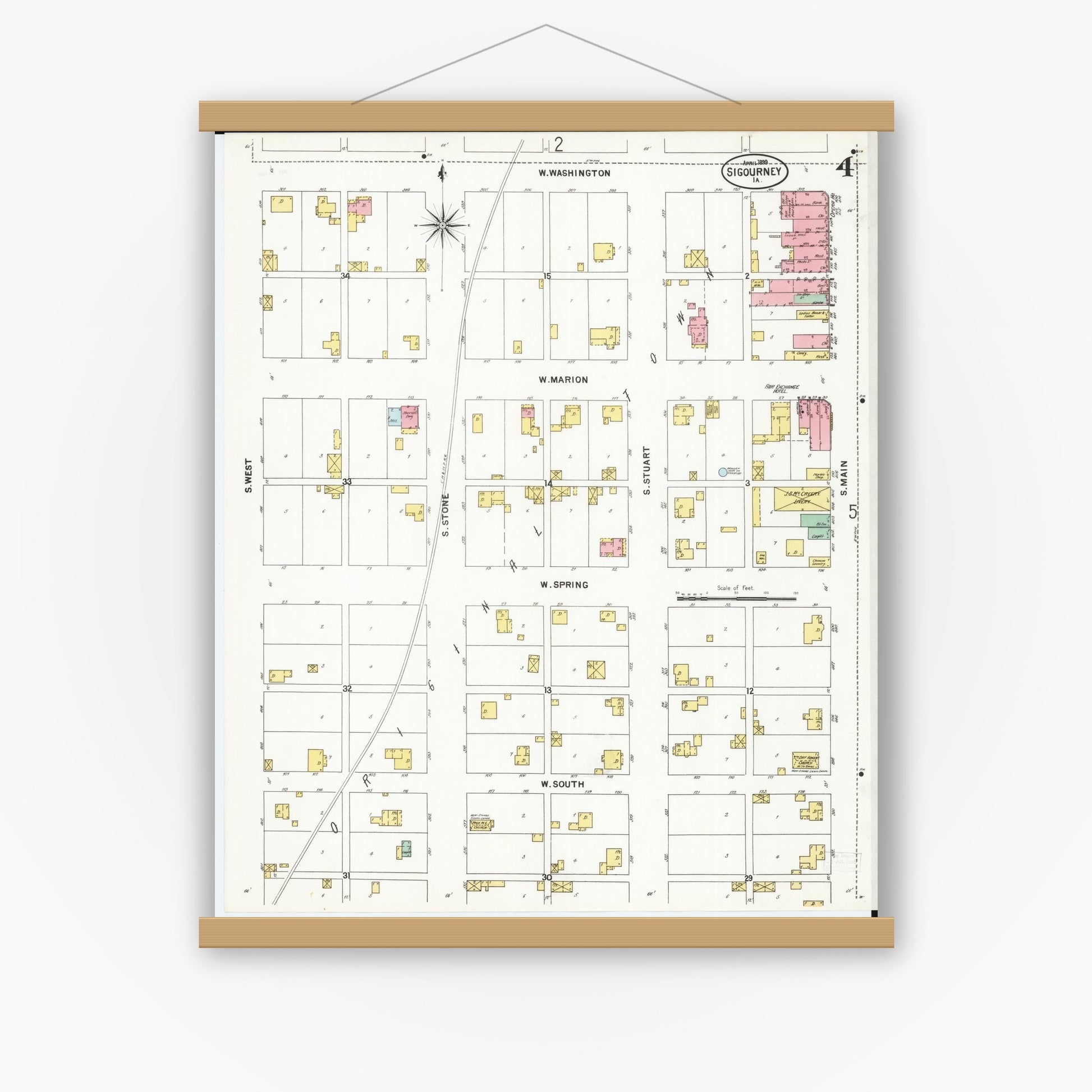 Old map wall art mockup — magnetic wood frame on white wall — Sanborn Fire Insurance Map from Sigourney, Kiokuk County, Iowa (1899), Sheet #0004