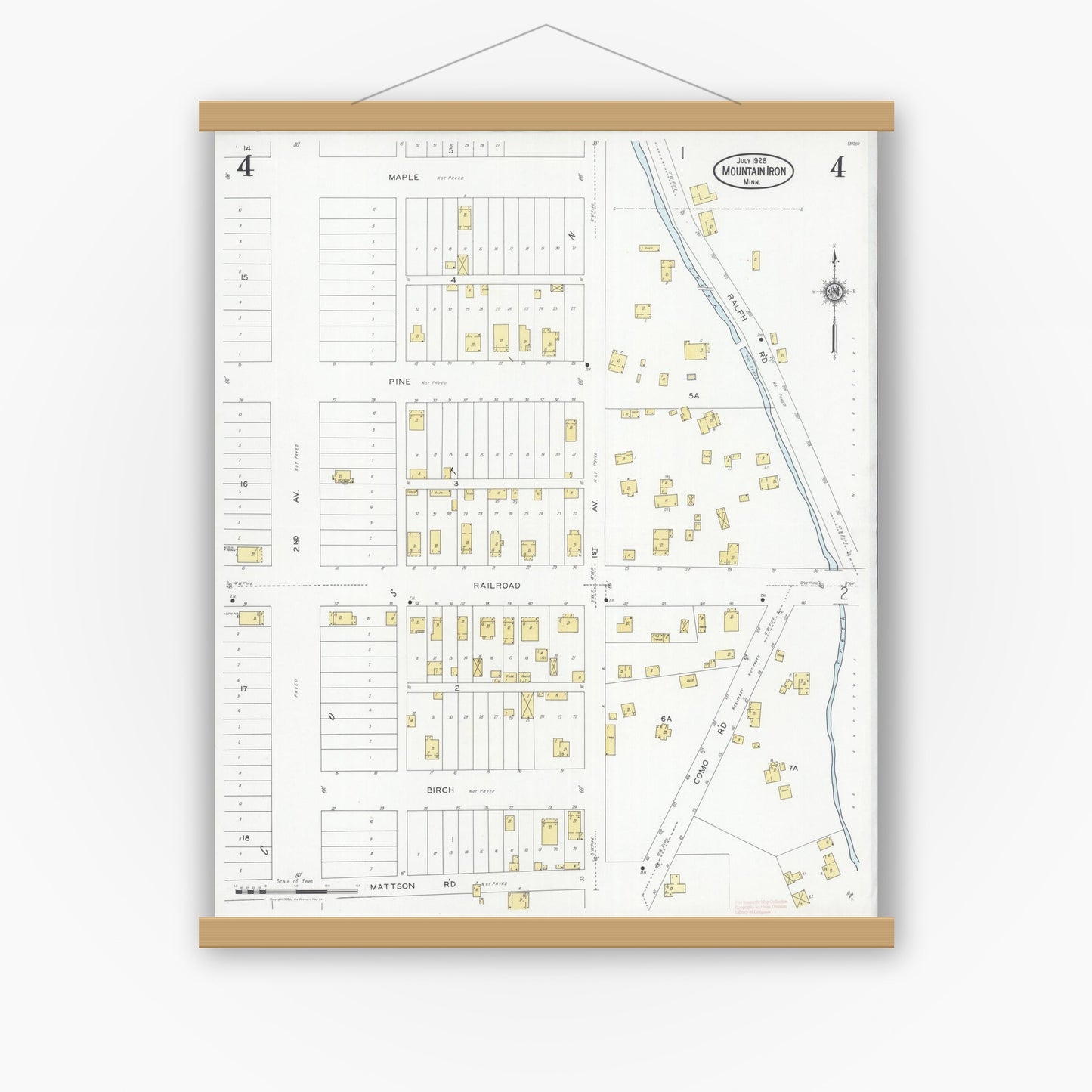 Old map wall art mockup — magnetic wood frame on white wall — Sanborn Fire Insurance Map from Mountain Iron, Saint Louis County, Minnesota (1928), Sheet #0004