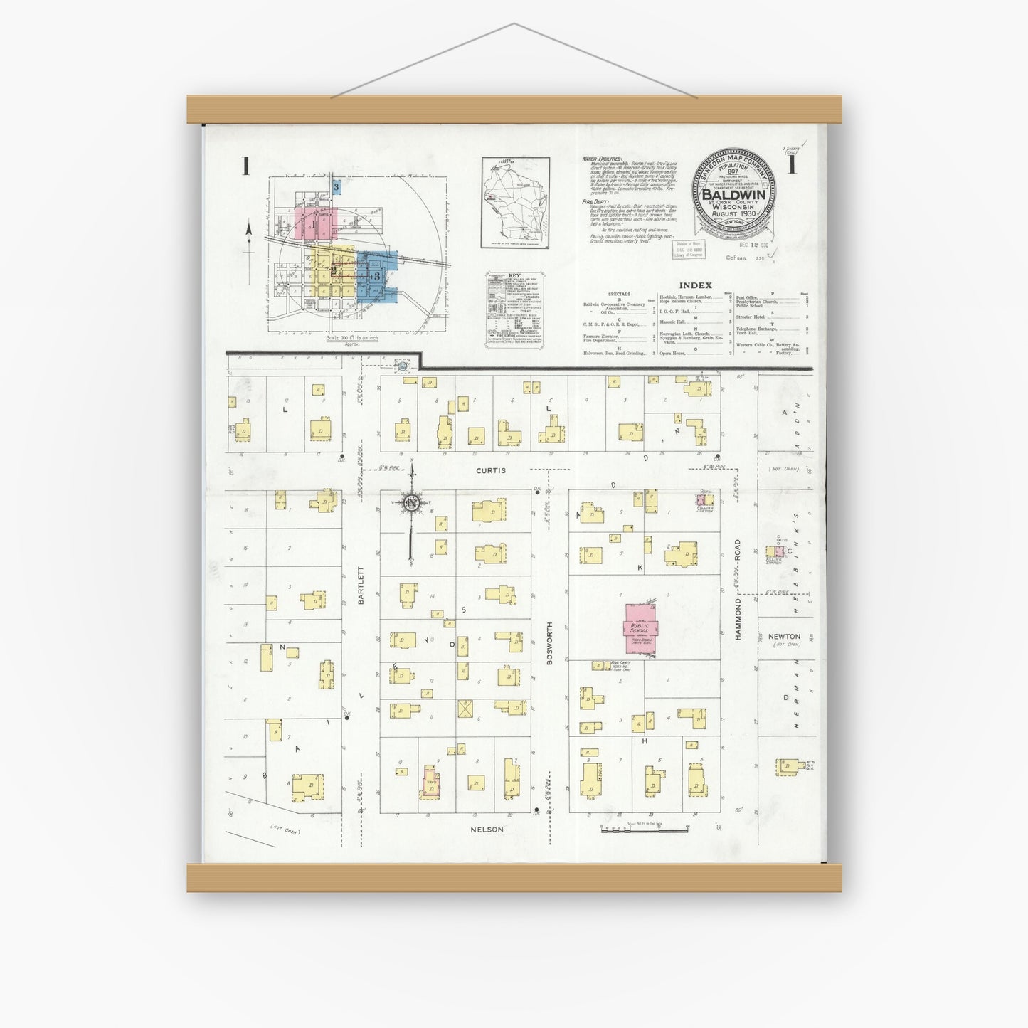 Old map wall art mockup — magnetic wood frame on white wall — Sanborn Fire Insurance Map from Baldwin, St. Croix County, Wisconsin (1930), Sheet #0001