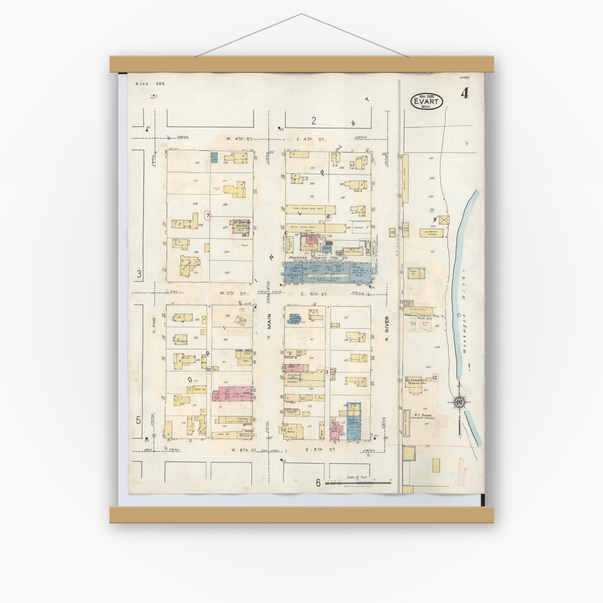Old map wall art mockup — magnetic wood frame on white wall — Sanborn Fire Insurance Map from Evart, Osceola County, Michigan (1942), Sheet #0004