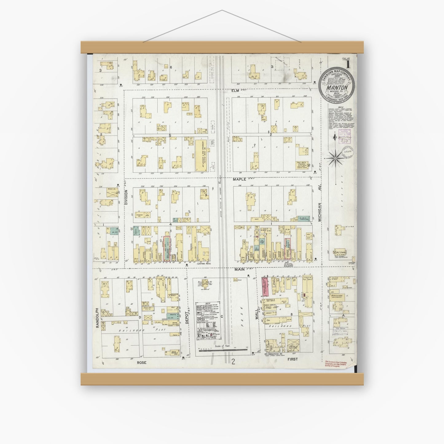 Old map wall art mockup — magnetic wood frame on white wall — Sanborn Fire Insurance Map from Manton, Wexford County, Michigan (1902) - Complete Map Set