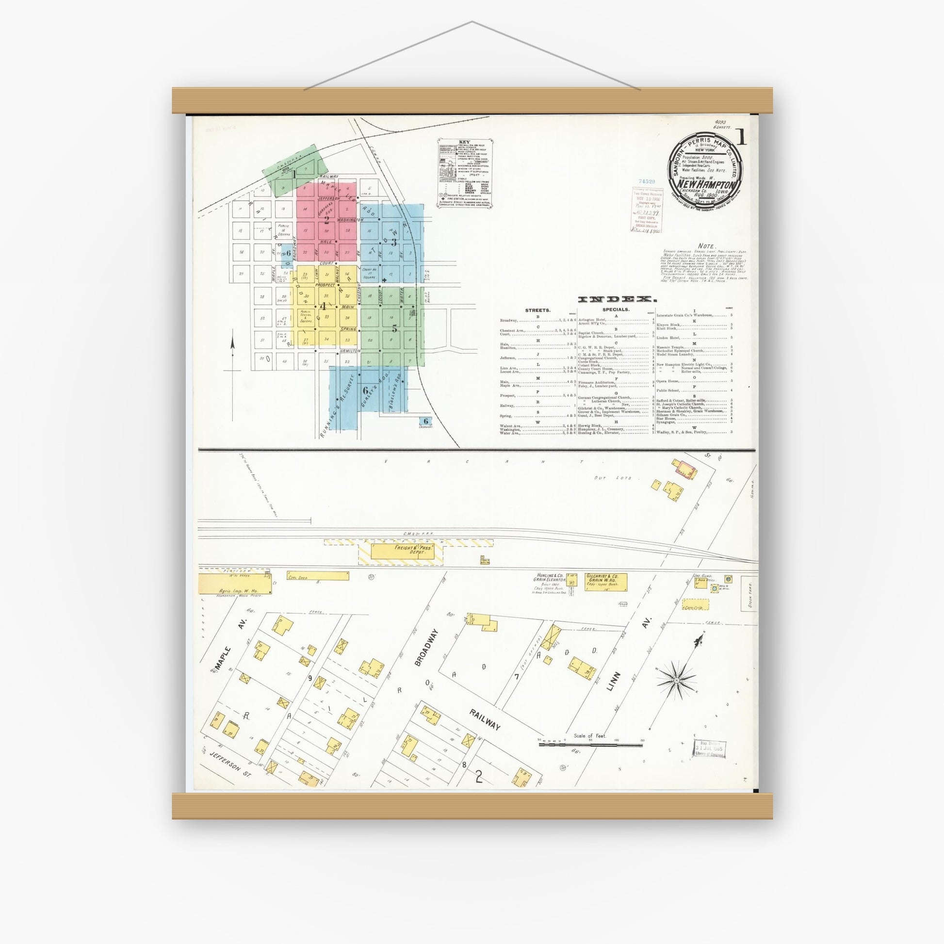 Old map wall art mockup — magnetic wood frame on white wall — Sanborn Fire Insurance Map from New Hampton, Chickasaw County, Iowa (1900) â€” Complete Set