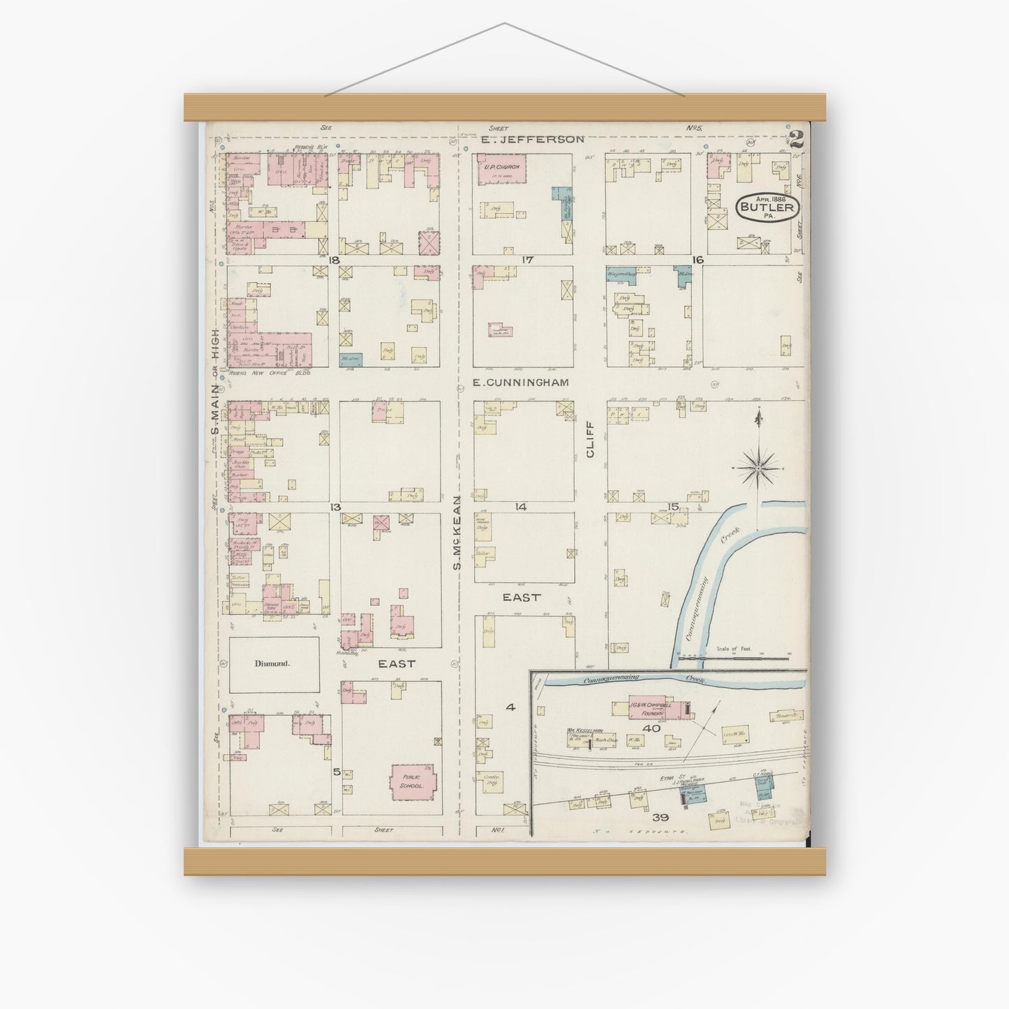 Old map wall art mockup — magnetic wood frame on white wall — Sanborn Fire Insurance Map from Butler, Butler County, Pennsylvania (1886), Sheet #0002