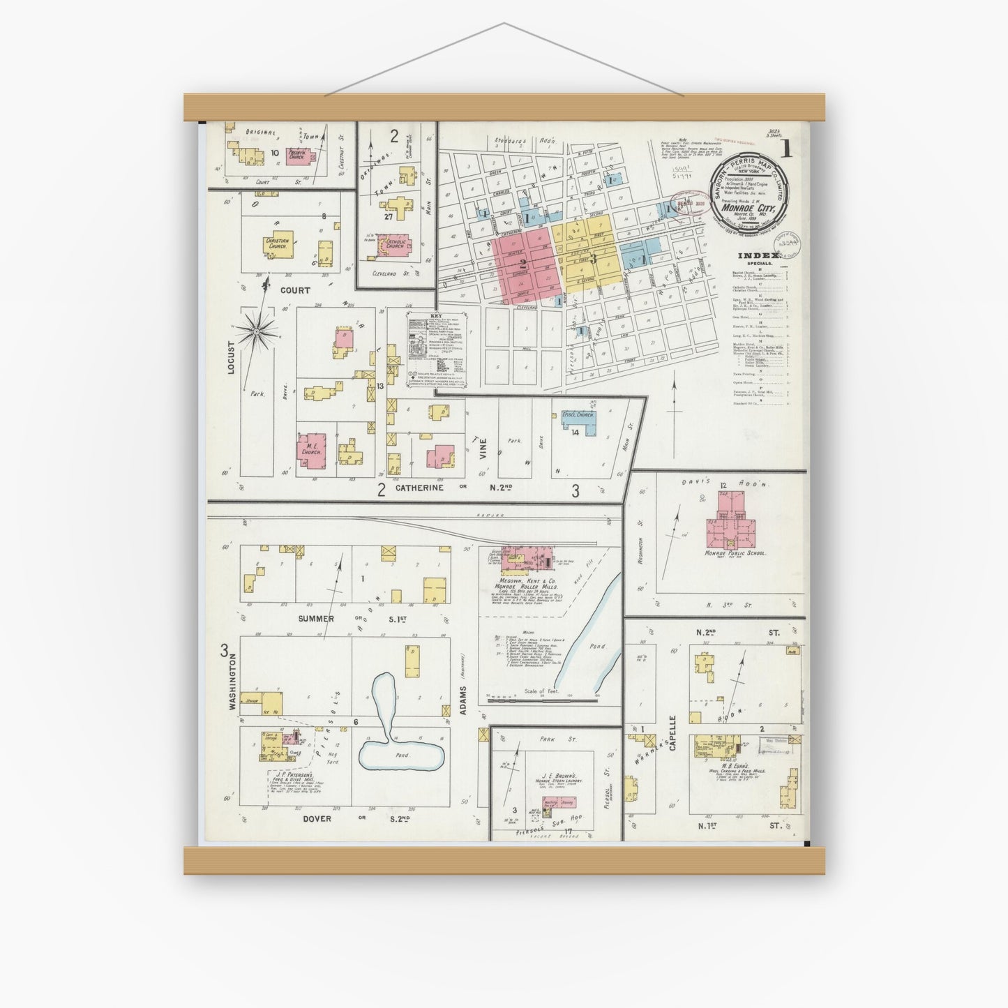 Old map wall art mockup — magnetic wood frame on white wall — Sanborn Fire Insurance Map from Monroe City, Monroe County, Missouri (1899) - Complete Map Set
