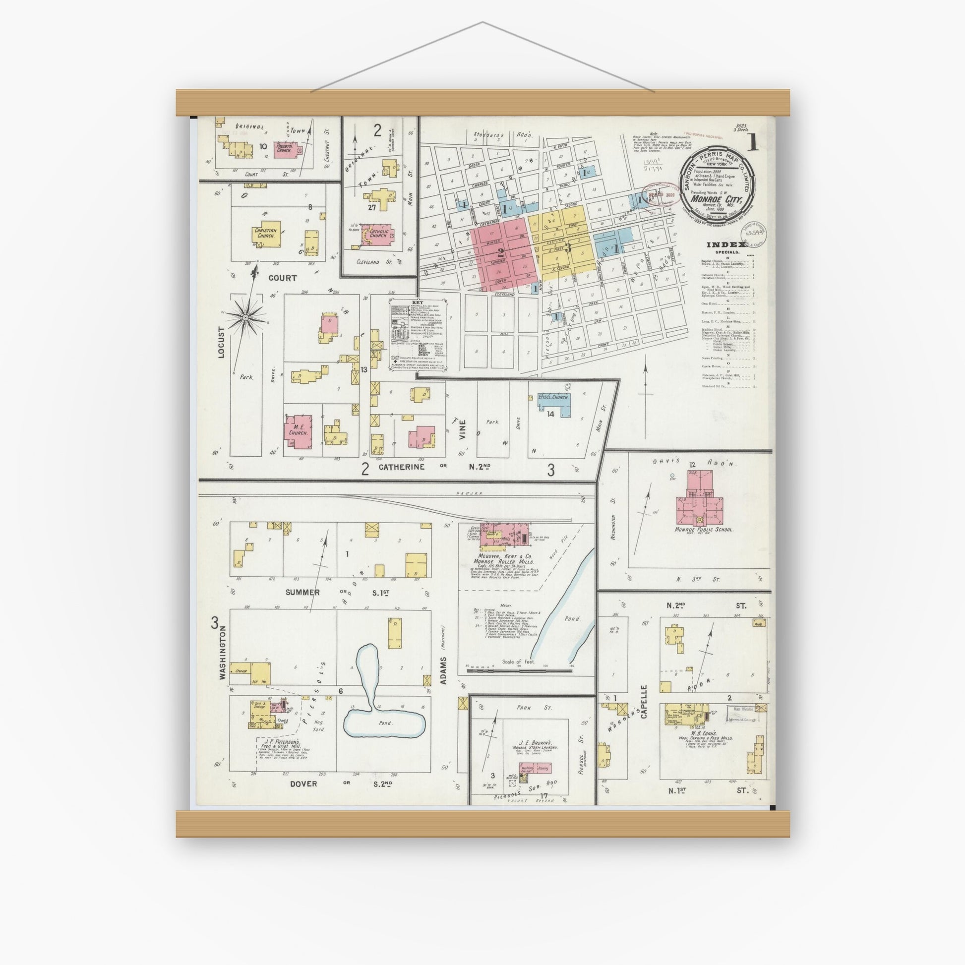 Old map wall art mockup — magnetic wood frame on white wall — Sanborn Fire Insurance Map from Monroe City, Monroe County, Missouri (1899) - Complete Map Set