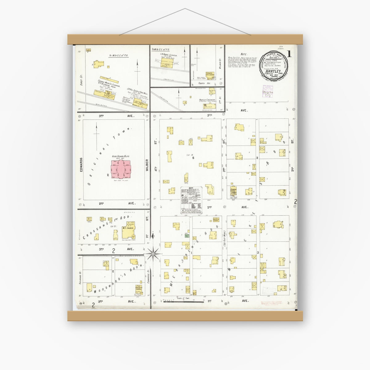Old map wall art mockup — magnetic wood frame on white wall — Sanborn Fire Insurance Map from Hartley, O'Brien County, Iowa (1901), Sheet #0001