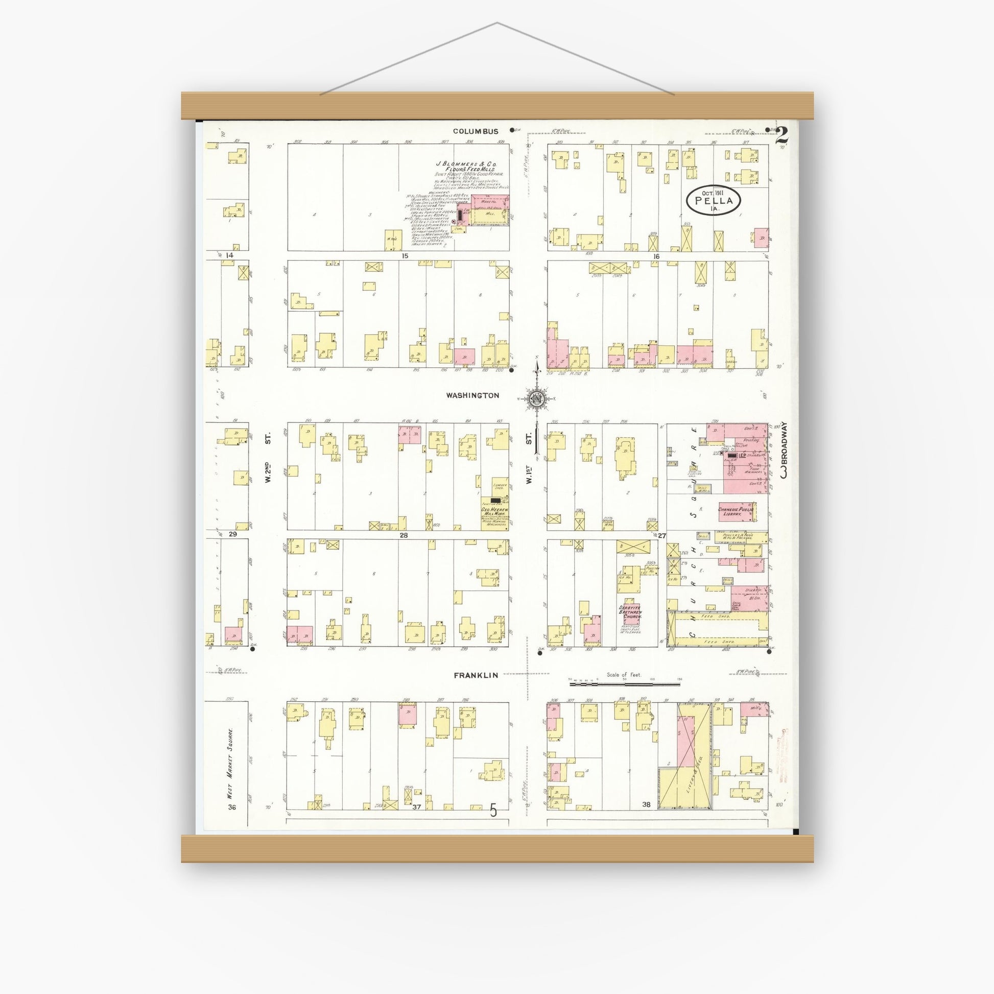 Old map wall art mockup — magnetic wood frame on white wall — Sanborn Fire Insurance Map from Pella, Marion County, Iowa (1911), Sheet #0002