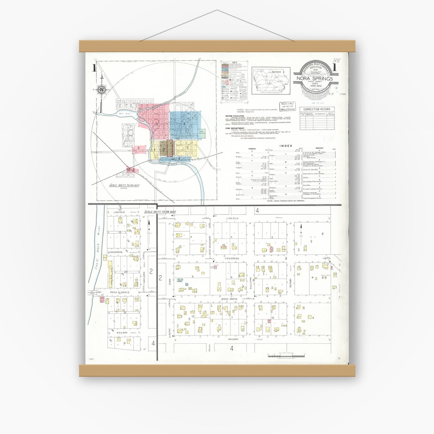 Old map wall art mockup — magnetic wood frame on white wall — Sanborn Fire Insurance Map from Nora Springs, Floyd County, Iowa (1942) â€” Complete Set