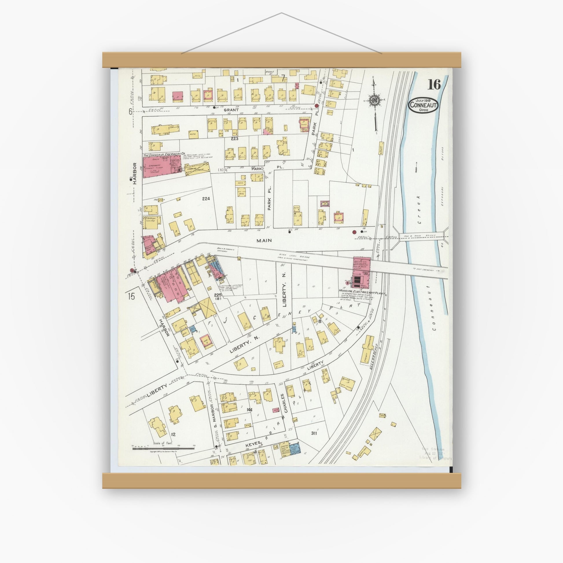 Old map wall art mockup — magnetic wood frame on white wall — Sanborn Fire Insurance Map from Conneaut, Ashtabula County, Ohio (1919), Sheet #0016