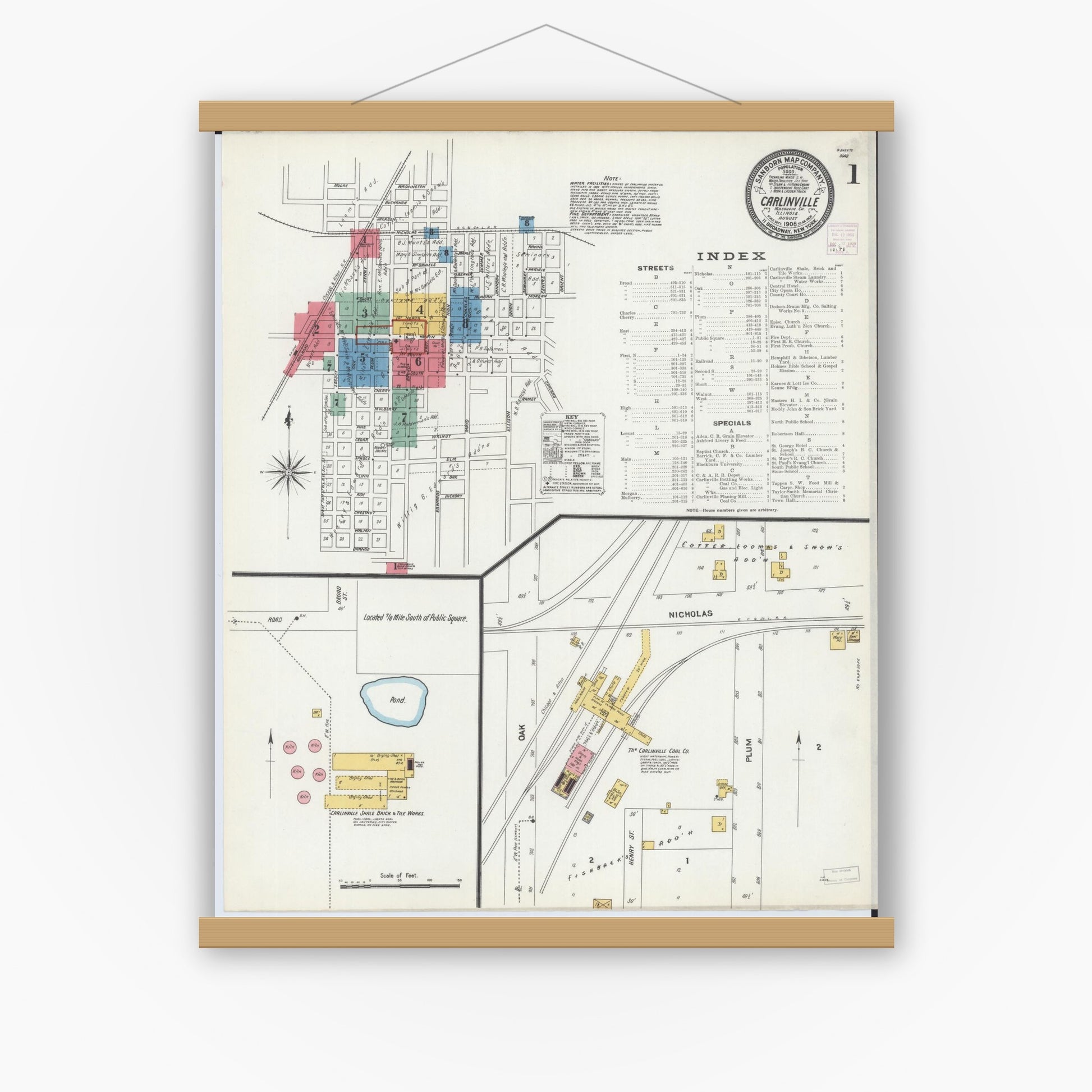 Old map wall art mockup — magnetic wood frame on white wall — Sanborn Fire Insurance Map from Carlinville, Macoupin County, Illinois (1906), Sheet #0001