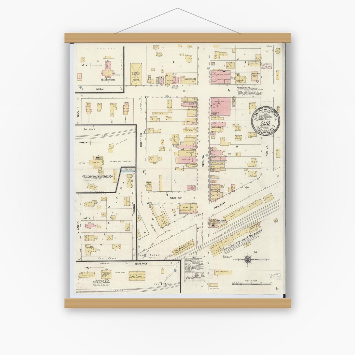Old map wall art mockup — magnetic wood frame on white wall — Sanborn Fire Insurance Map from Clio, Genesee County, Michigan (1910), Sheet #0001