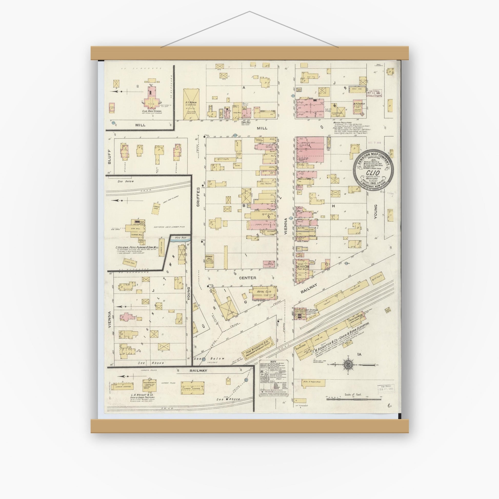 Old map wall art mockup — magnetic wood frame on white wall — Sanborn Fire Insurance Map from Clio, Genesee County, Michigan (1910), Sheet #0001