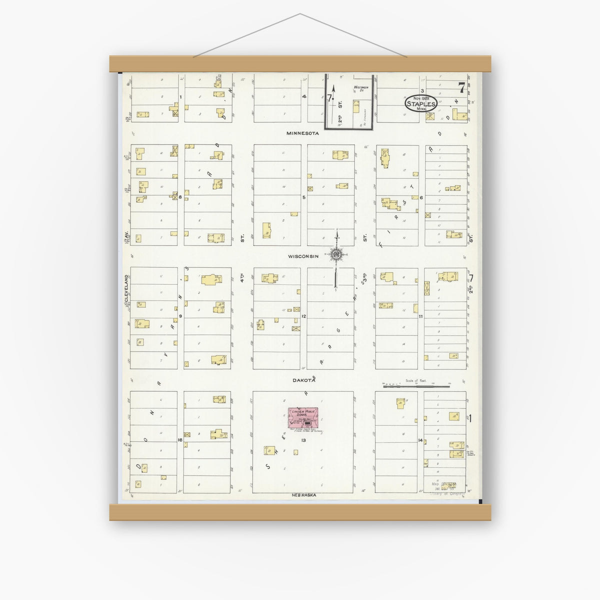 Old map wall art mockup — magnetic wood frame on white wall — Sanborn Fire Insurance Map from Staples, Todd County, Minnesota (1909), Sheet #0007