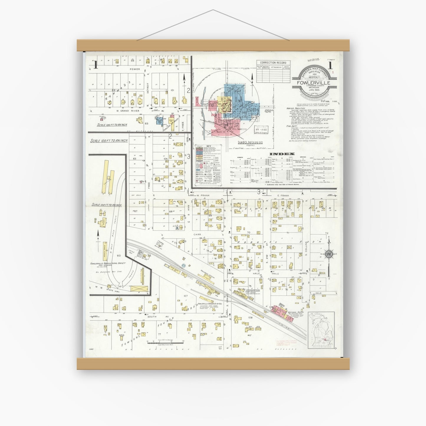 Old map wall art mockup — magnetic wood frame on white wall — Sanborn Fire Insurance Map from Fowlerville, Livingston County, Michigan (1935) - Complete Map Set