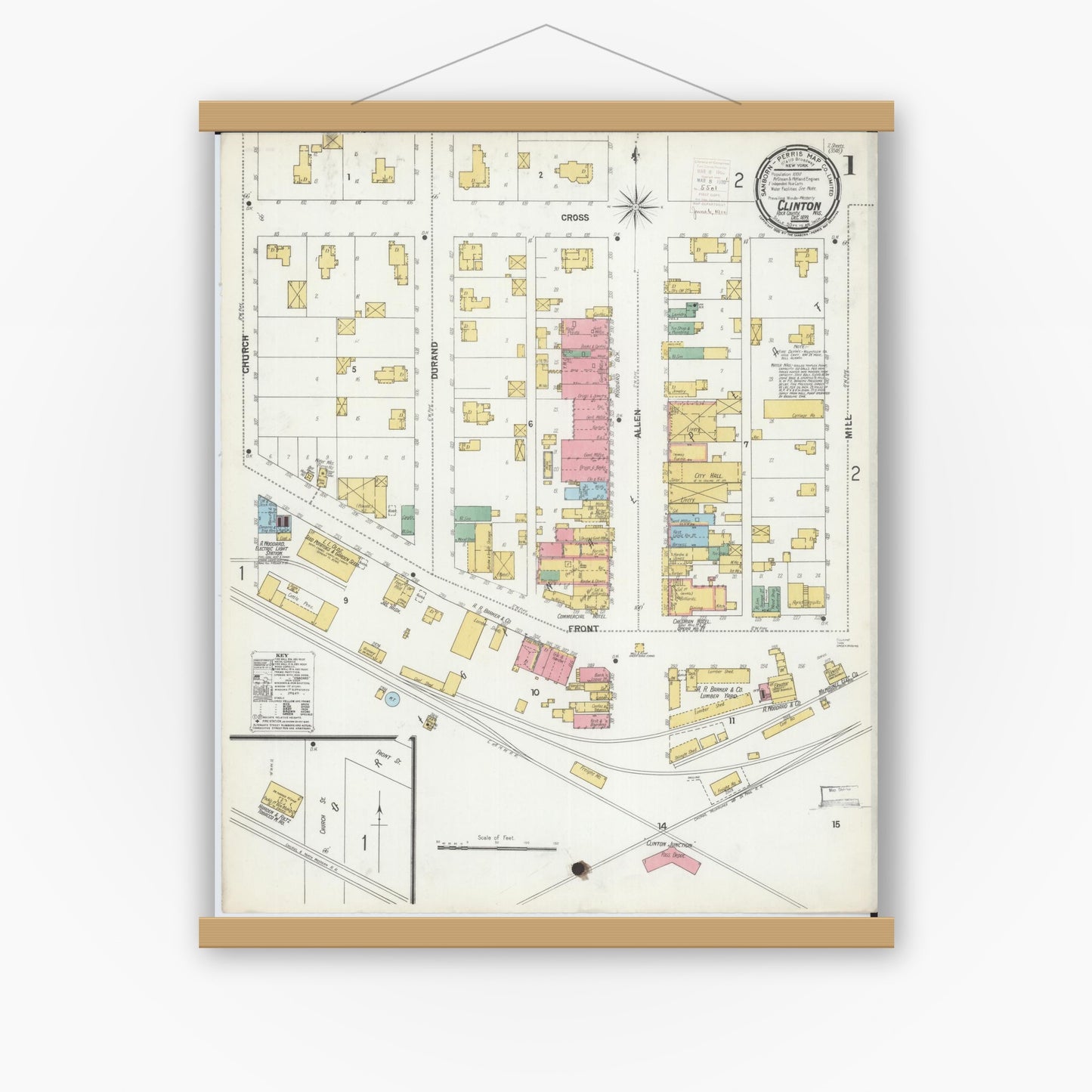 Old map wall art mockup — magnetic wood frame on white wall — Sanborn Fire Insurance Map from Clinton, Rock County, Wisconsin (1899), Sheet #0001