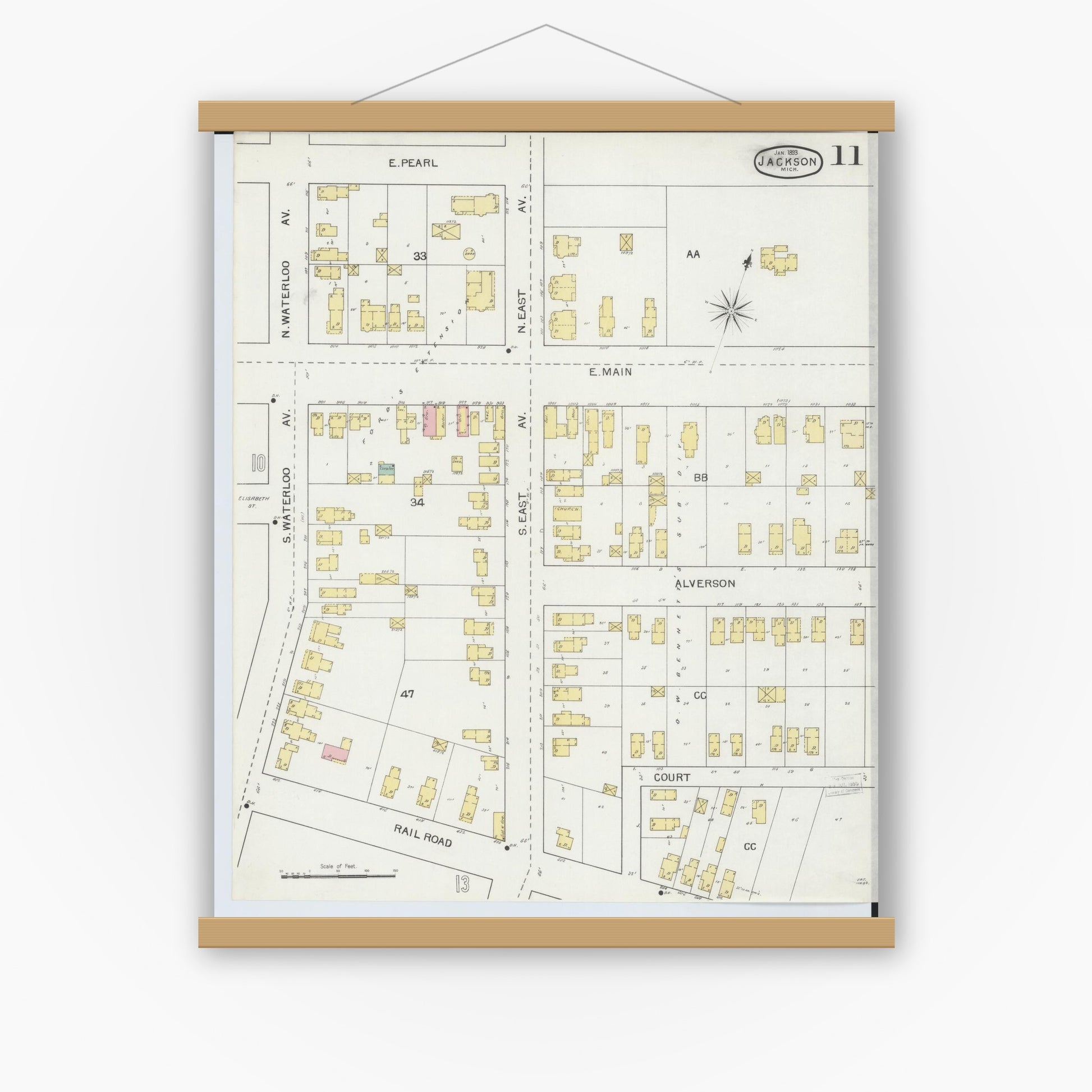 Old map wall art mockup — magnetic wood frame on white wall — Sanborn Fire Insurance Map from Jackson, Jackson County, Michigan (1893), Sheet #0011