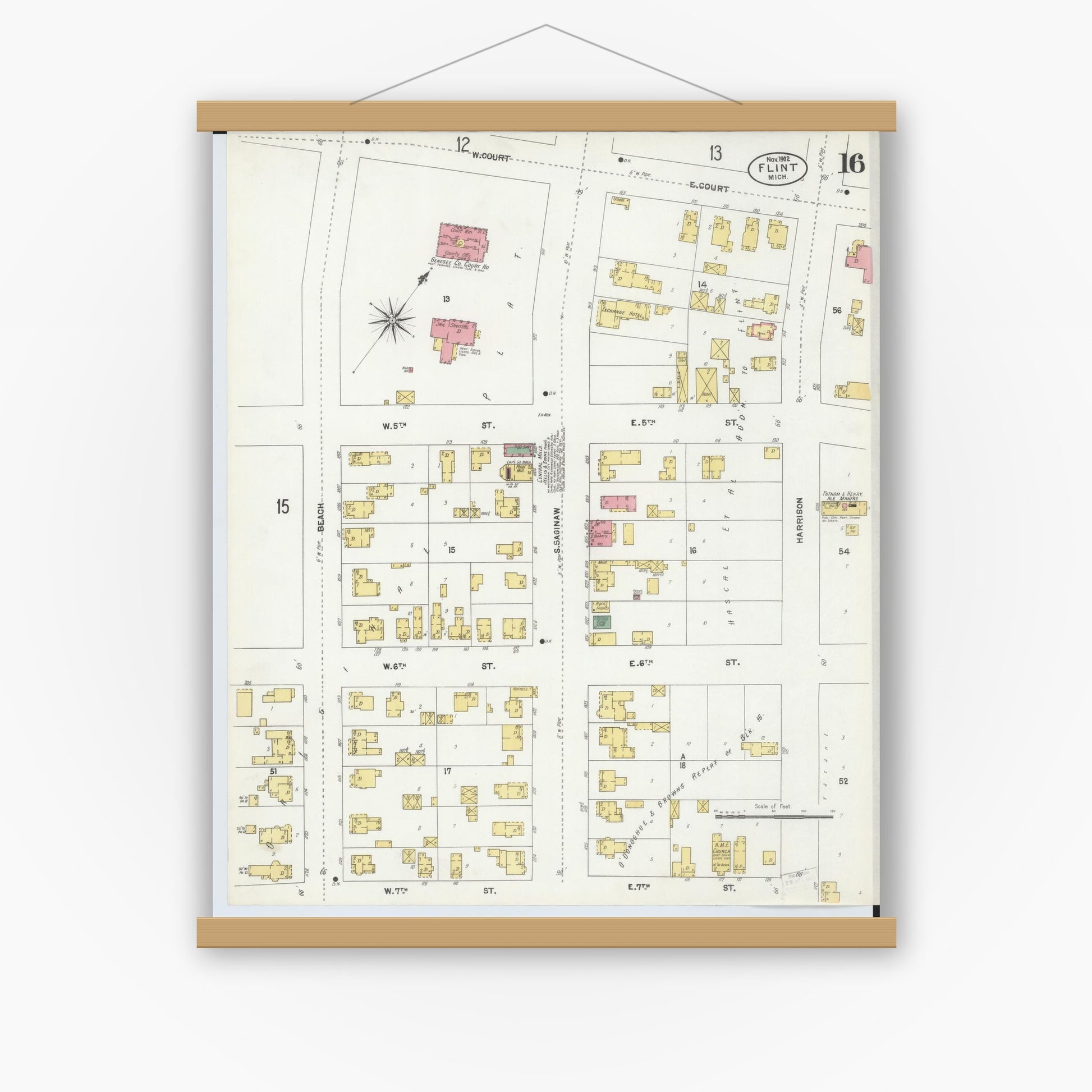Old map wall art mockup — magnetic wood frame on white wall — Sanborn Fire Insurance Map from Flint, Genesee County, Michigan (1902), Sheet #0016