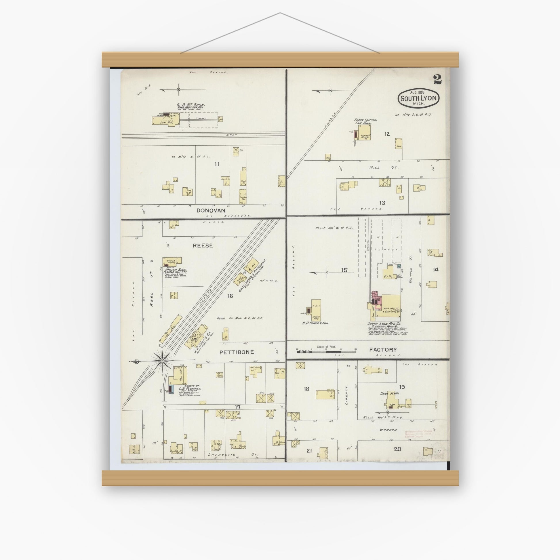 Old map wall art mockup — magnetic wood frame on white wall — Sanborn Fire Insurance Map from South Lyon, Oakland County, Michigan (1893), Sheet #0002