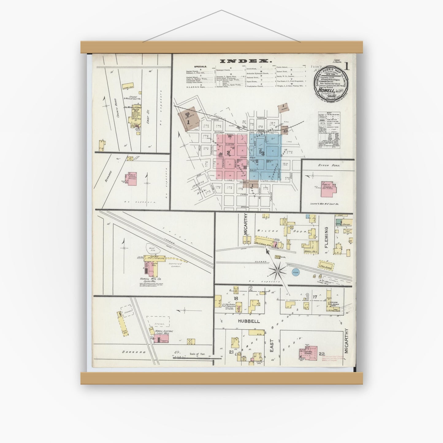 Old map wall art mockup — magnetic wood frame on white wall — Sanborn Fire Insurance Map from Howell, Livingston County, Michigan (1892), Sheet #0001