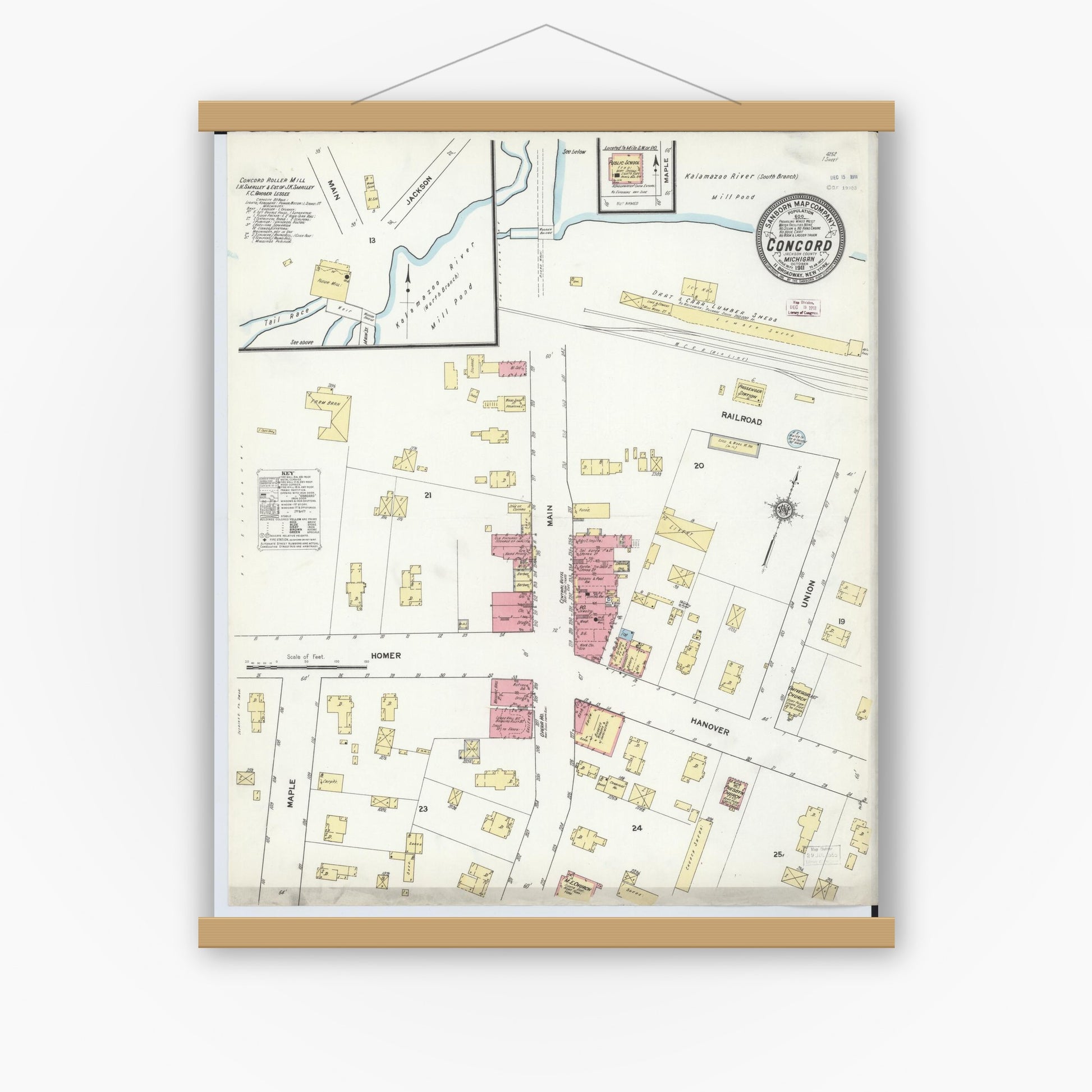 Old map wall art mockup — magnetic wood frame on white wall — Sanborn Fire Insurance Map from Concord, Jackson County, Michigan (1911), Sheet #0001
