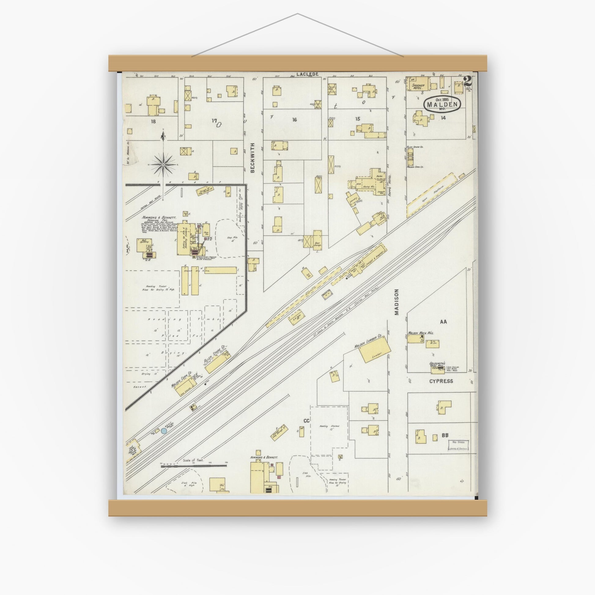 Old map wall art mockup — magnetic wood frame on white wall — Sanborn Fire Insurance Map from Malden, Dunklin County, Missouri (1895), Sheet #0002