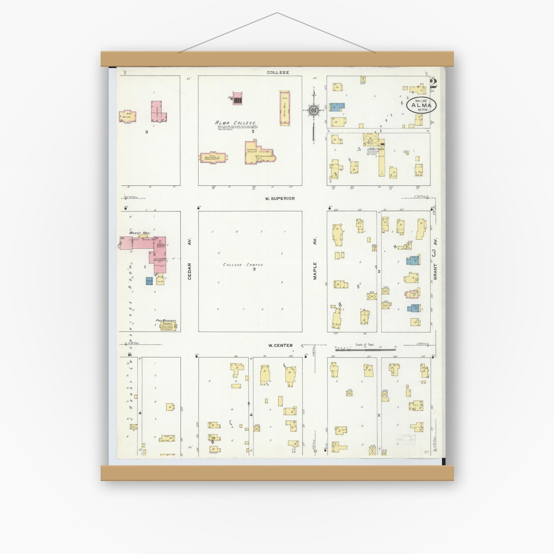 Old map wall art mockup — magnetic wood frame on white wall — Sanborn Fire Insurance Map from Alma, Gratiot County, Michigan (1910), Sheet #0002