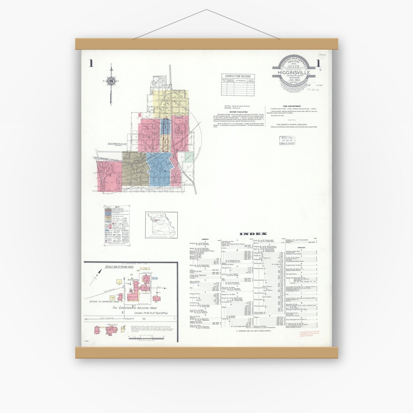 Old map wall art mockup — magnetic wood frame on white wall — Sanborn Fire Insurance Map from Higginsville, Lafayette County, Missouri (1942) - Complete Map Set