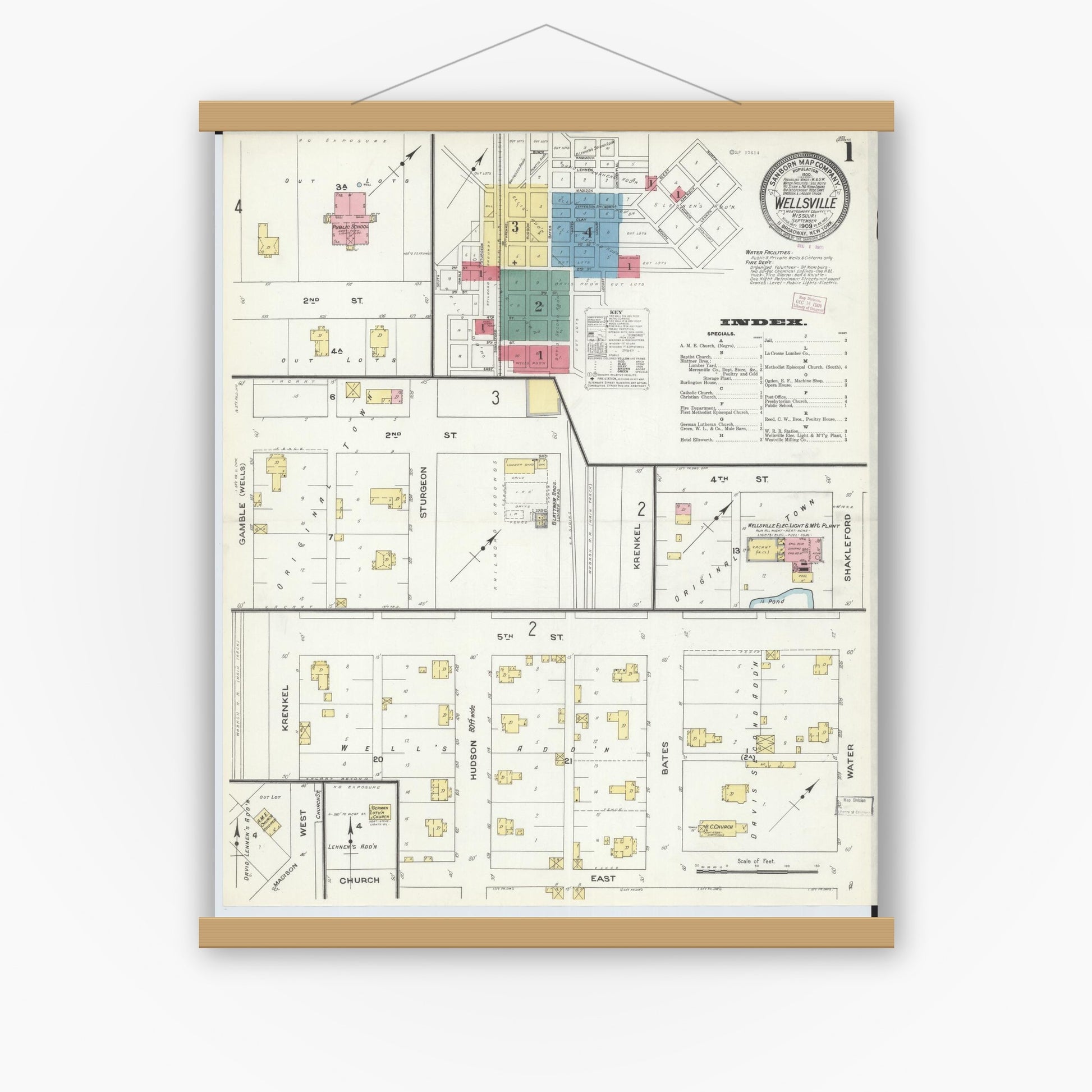 Old map wall art mockup — magnetic wood frame on white wall — Sanborn Fire Insurance Map from Wellsville, Montgomery County, Missouri (1909) - Complete Map Set