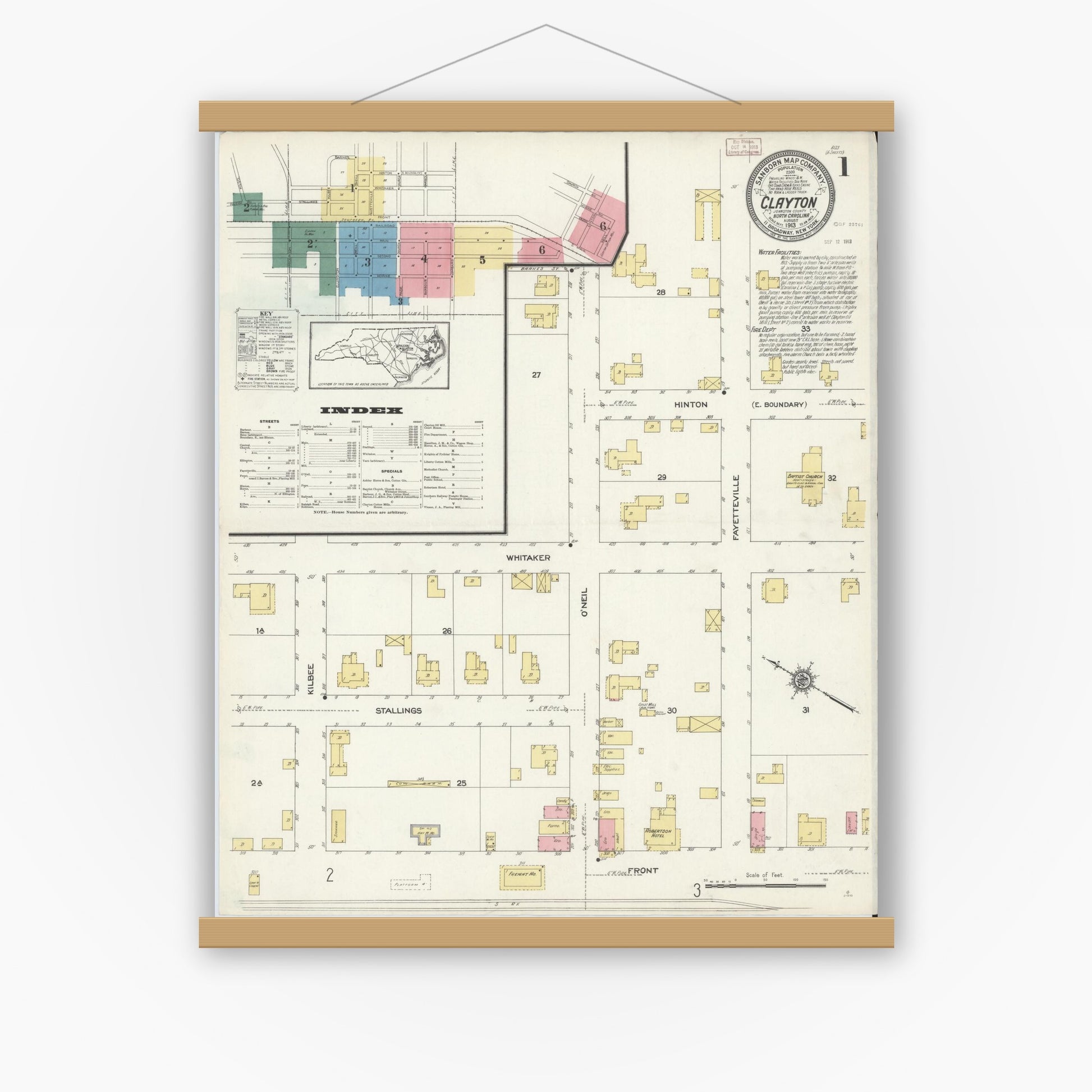 Old map wall art mockup — magnetic wood frame on white wall — Sanborn Fire Insurance Map from Clayton, Johnston County, North Carolina (1913) - Complete Map Set