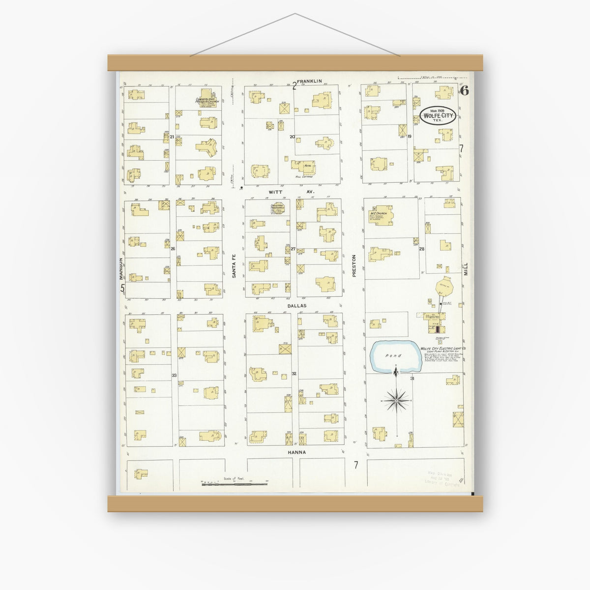 Old map wall art mockup — magnetic wood frame on white wall — Sanborn Fire Insurance Map from Wolfe City, Hunt County, Texas (1909), Sheet #0006