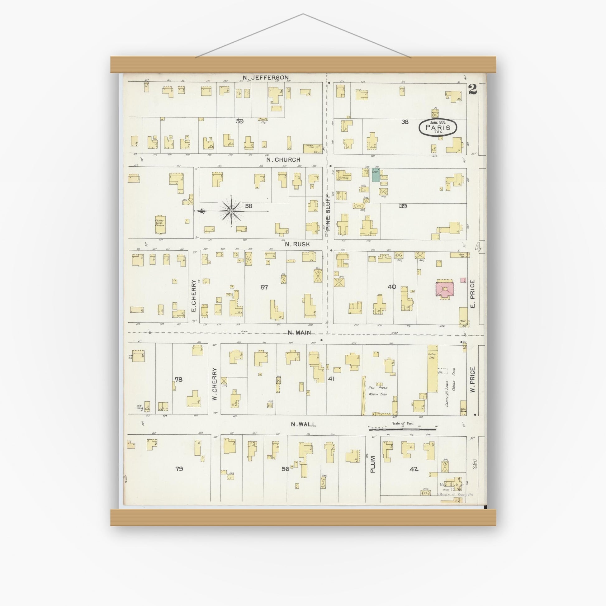 Old map wall art mockup — magnetic wood frame on white wall — Sanborn Fire Insurance Map from Paris, Lamar County, Texas (1892), Sheet #0002