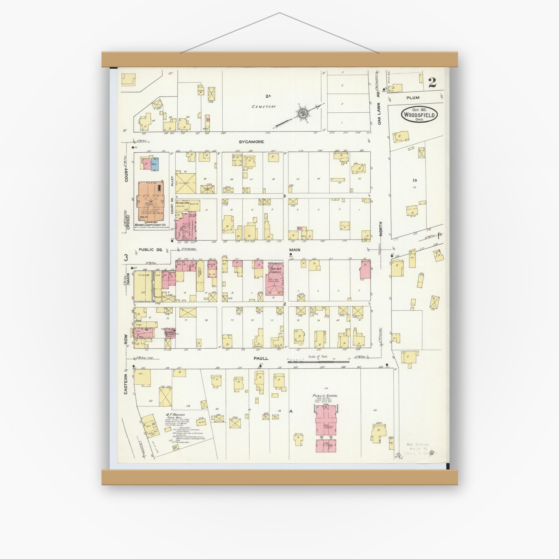 Old map wall art mockup — magnetic wood frame on white wall — Sanborn Fire Insurance Map from Woodsfield, Monroe County, Ohio (1911), Sheet #0002