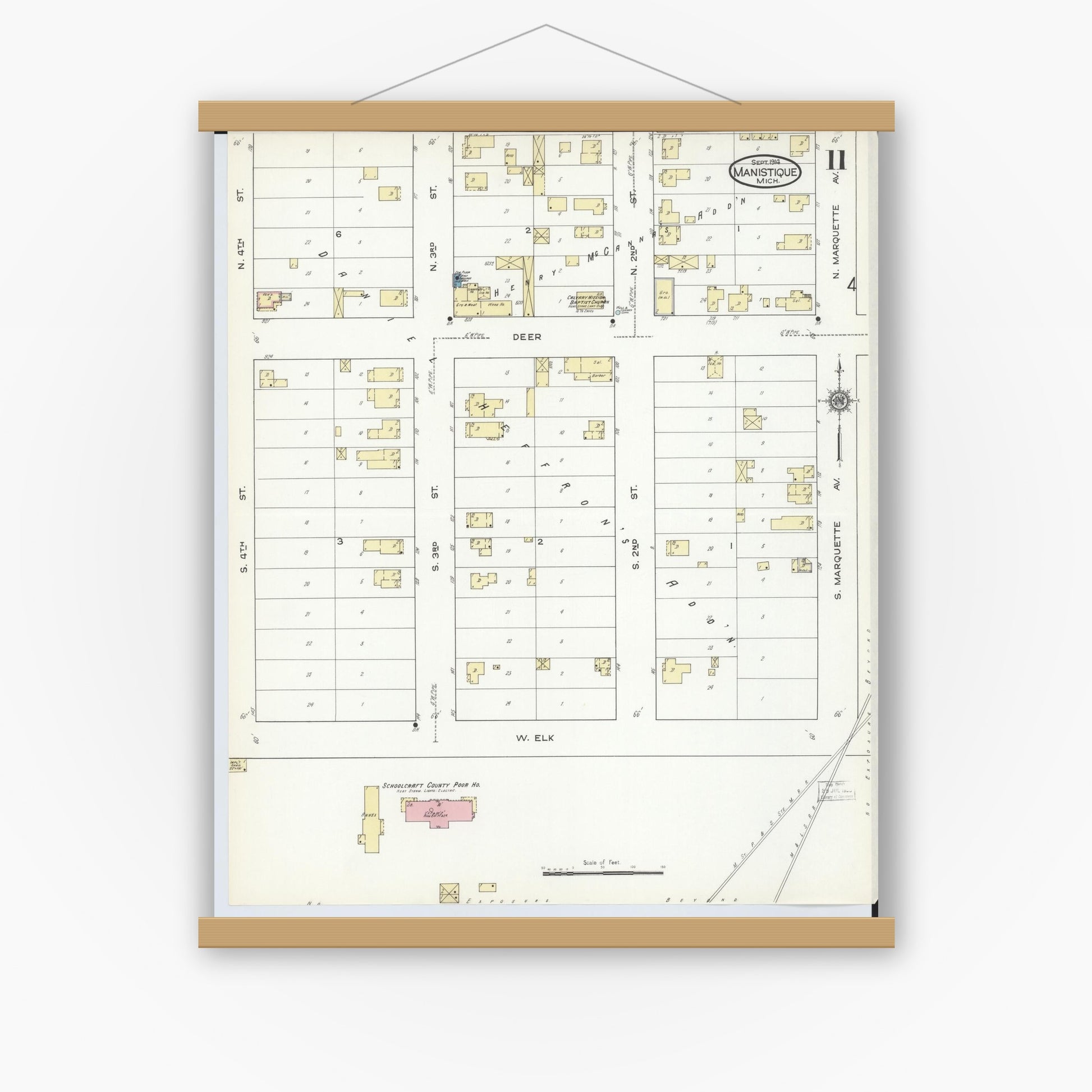 Old map wall art mockup — magnetic wood frame on white wall — Sanborn Fire Insurance Map from Manistique, Schoolcraft County, Michigan (1914), Sheet #0011