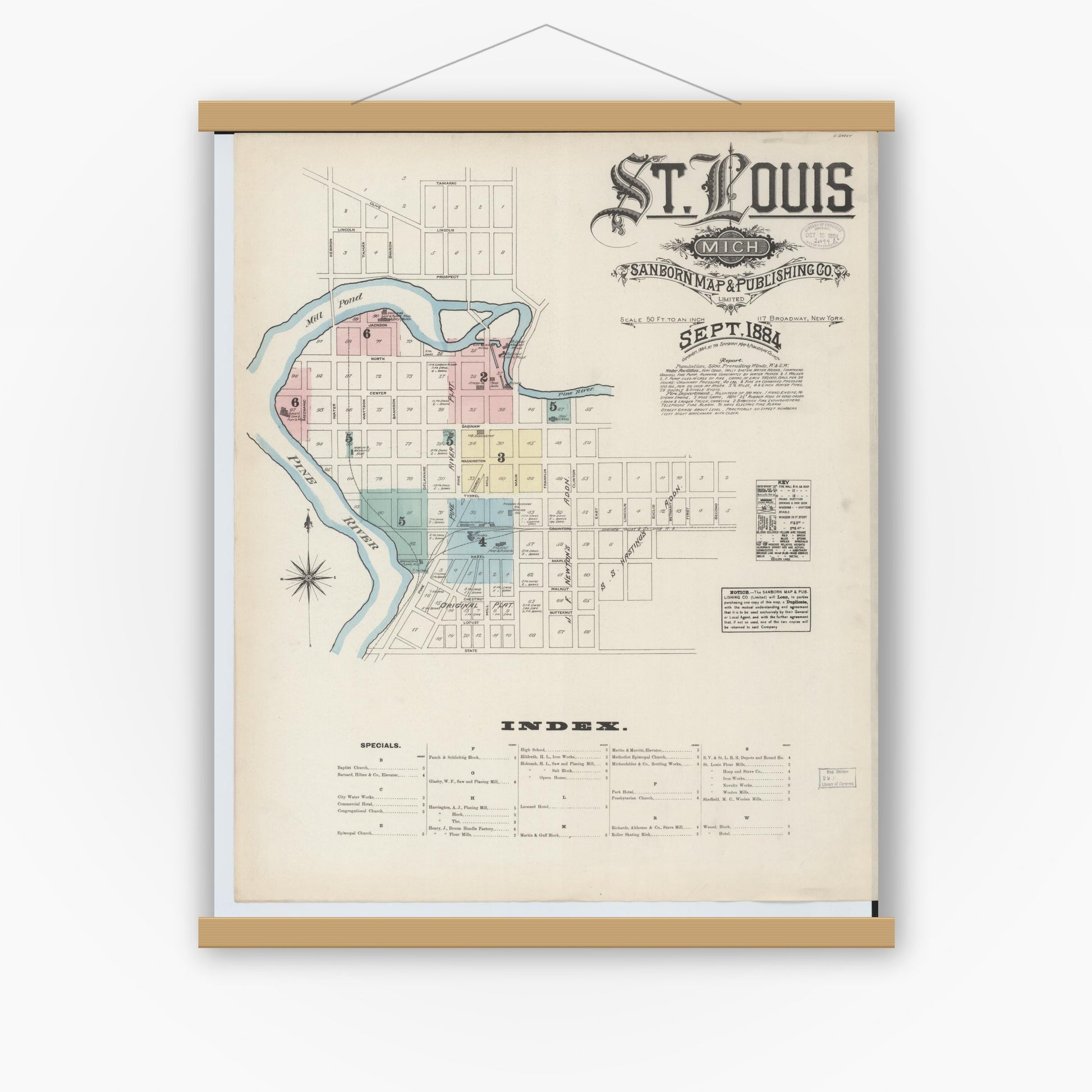 Old map wall art mockup — magnetic wood frame on white wall — Sanborn Fire Insurance Map from Saint Louis, Gratiot County, Michigan (1884) - Complete Map Set